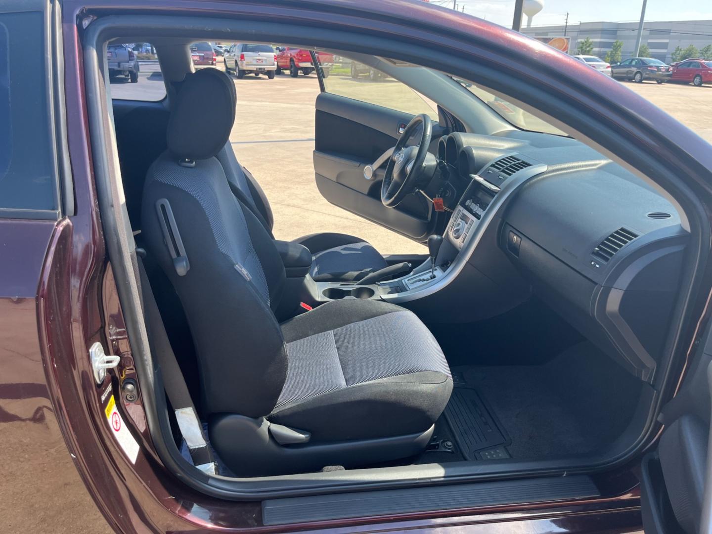 2008 purple /black Scion tC Sport Coupe (JTKDE167980) with an 2.4L L4 DOHC 16V engine, Automatic transmission, located at 14700 Tomball Parkway 249, Houston, TX, 77086, (281) 444-2200, 29.928619, -95.504074 - Photo#11