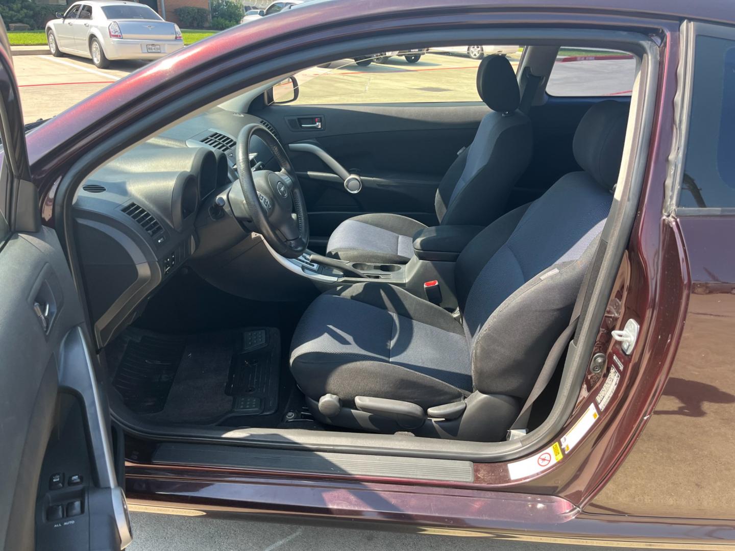 2008 purple /black Scion tC Sport Coupe (JTKDE167980) with an 2.4L L4 DOHC 16V engine, Automatic transmission, located at 14700 Tomball Parkway 249, Houston, TX, 77086, (281) 444-2200, 29.928619, -95.504074 - Photo#8