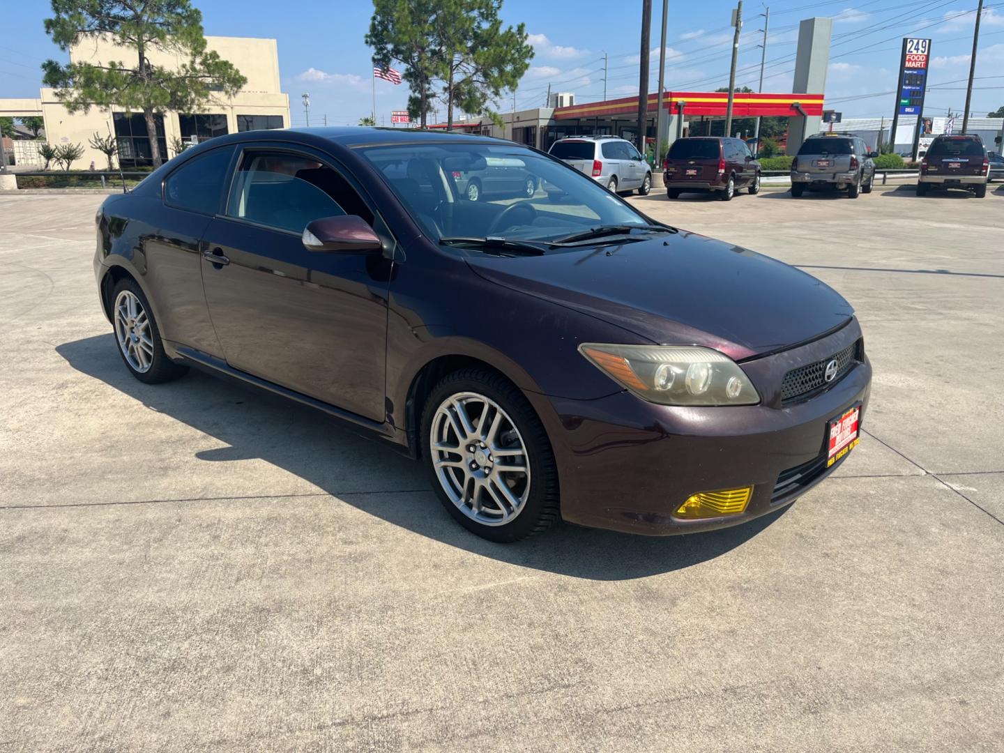 2008 purple /black Scion tC Sport Coupe (JTKDE167980) with an 2.4L L4 DOHC 16V engine, Automatic transmission, located at 14700 Tomball Parkway 249, Houston, TX, 77086, (281) 444-2200, 29.928619, -95.504074 - Photo#0