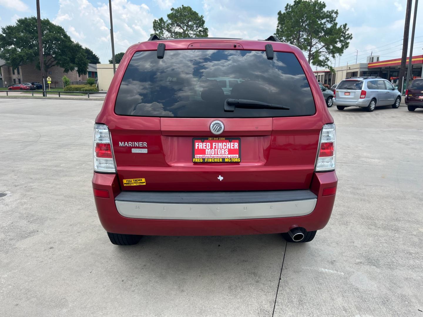 2009 red Mercury Mariner Premier V6 2WD (4M2CU87G39K) , 6-Speed Automatic transmission, located at 14700 Tomball Parkway 249, Houston, TX, 77086, (281) 444-2200, 29.928619, -95.504074 - Photo#5