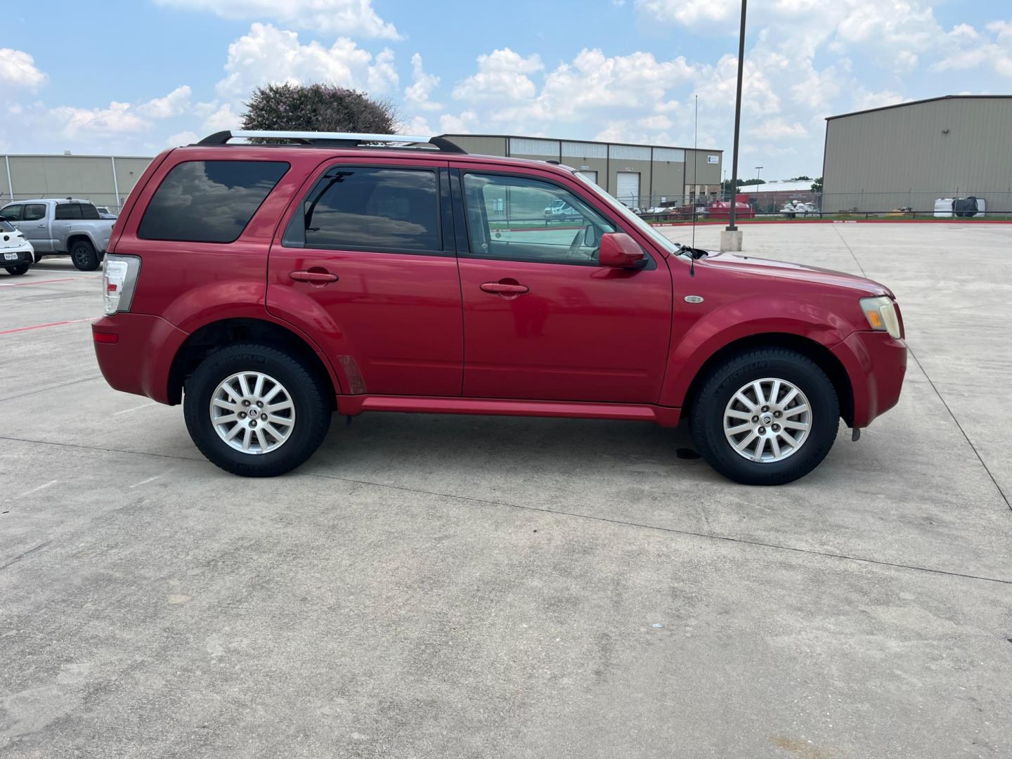 2009 red Mercury Mariner Premier V6 2WD (4M2CU87G39K) , 6-Speed Automatic transmission, located at 14700 Tomball Parkway 249, Houston, TX, 77086, (281) 444-2200, 29.928619, -95.504074 - Photo#7