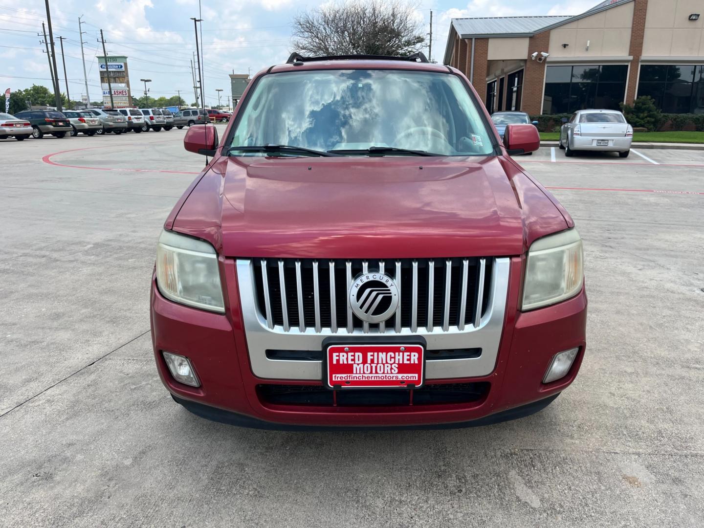 2009 red Mercury Mariner Premier V6 2WD (4M2CU87G39K) , 6-Speed Automatic transmission, located at 14700 Tomball Parkway 249, Houston, TX, 77086, (281) 444-2200, 29.928619, -95.504074 - Photo#1