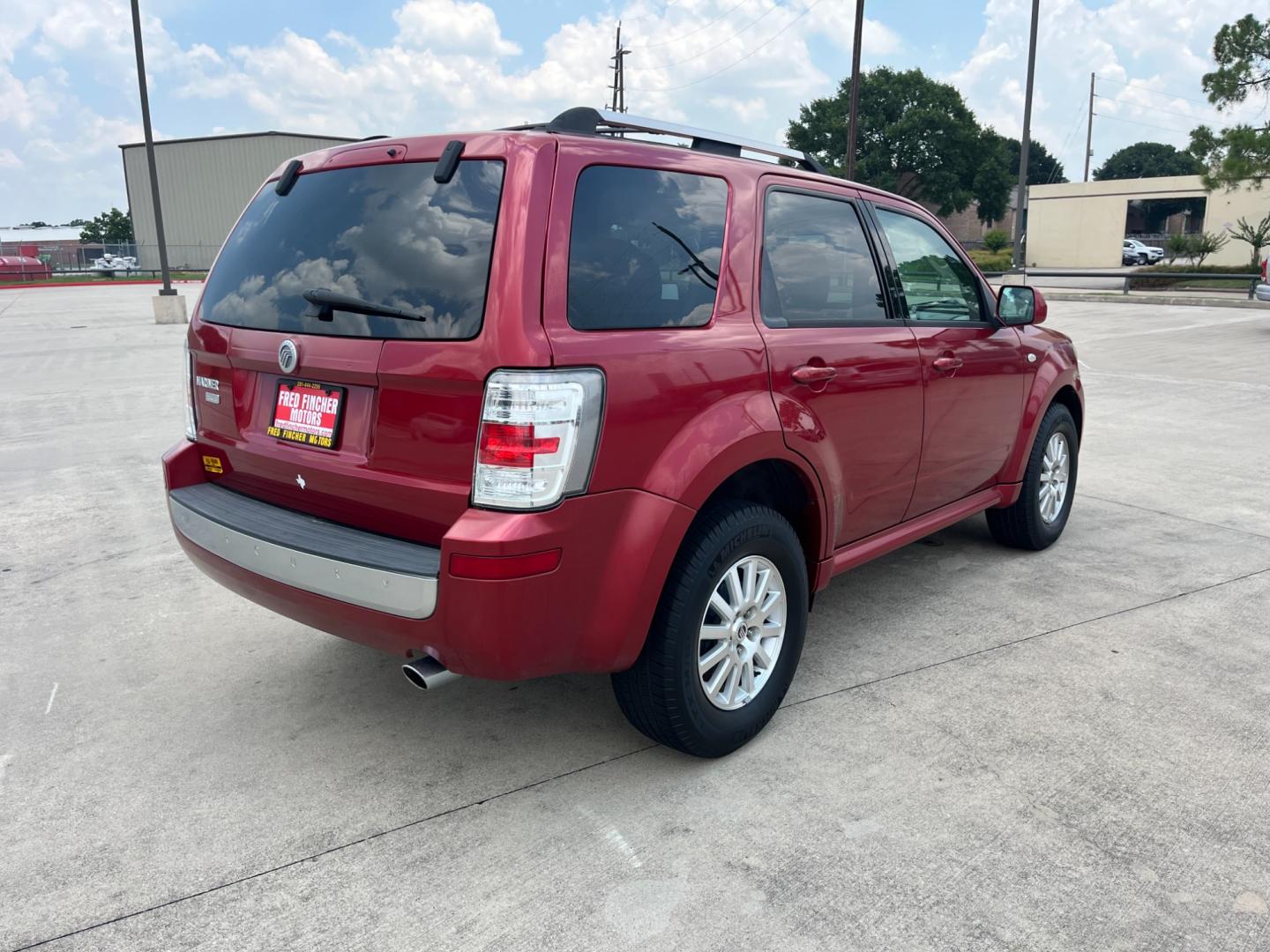 2009 red Mercury Mariner Premier V6 2WD (4M2CU87G39K) , 6-Speed Automatic transmission, located at 14700 Tomball Parkway 249, Houston, TX, 77086, (281) 444-2200, 29.928619, -95.504074 - Photo#6