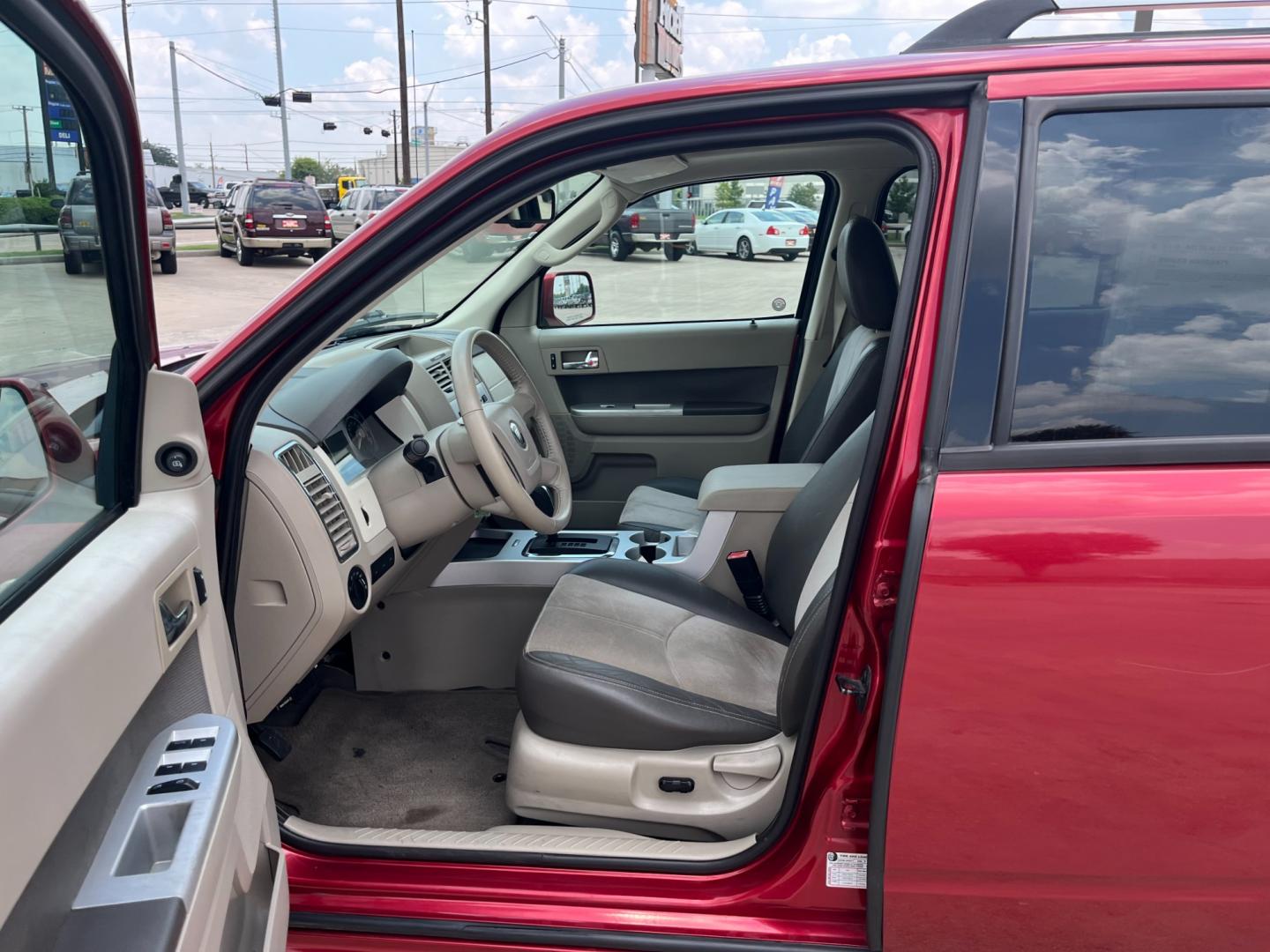 2009 red Mercury Mariner Premier V6 2WD (4M2CU87G39K) , 6-Speed Automatic transmission, located at 14700 Tomball Parkway 249, Houston, TX, 77086, (281) 444-2200, 29.928619, -95.504074 - Photo#8