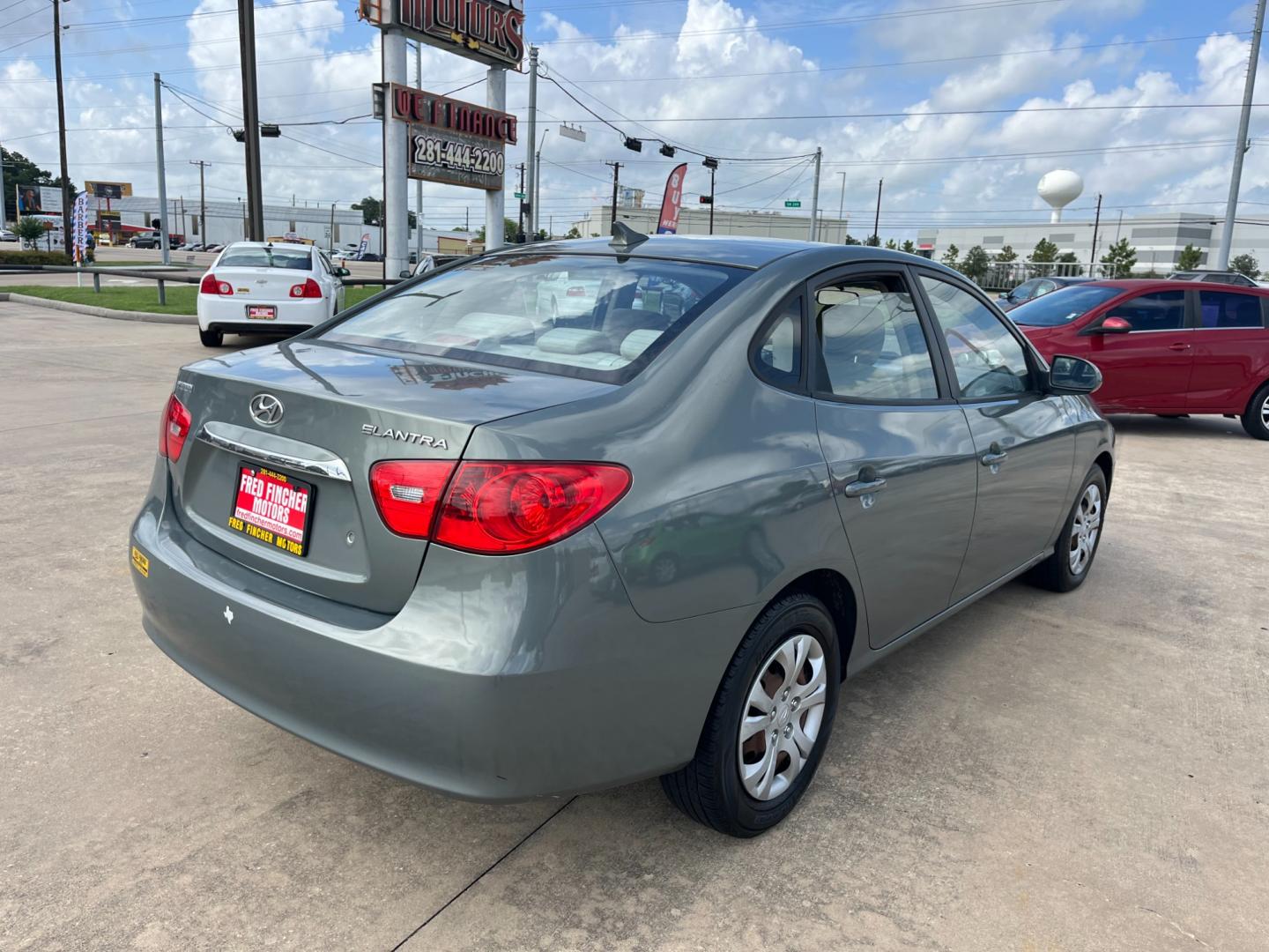 2010 green /gray Hyundai Elantra GLS (KMHDU4AD7AU) with an 2.0L L4 DOHC 16V engine, Automatic transmission, located at 14700 Tomball Parkway 249, Houston, TX, 77086, (281) 444-2200, 29.928619, -95.504074 - Photo#6