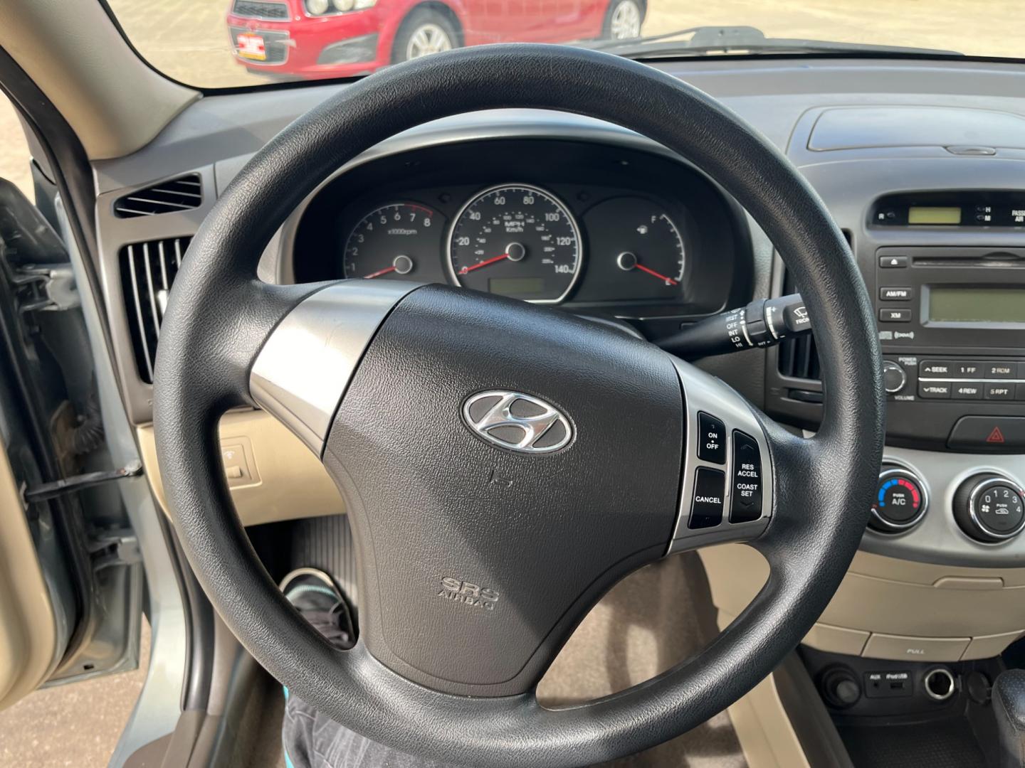 2010 green /gray Hyundai Elantra GLS (KMHDU4AD7AU) with an 2.0L L4 DOHC 16V engine, Automatic transmission, located at 14700 Tomball Parkway 249, Houston, TX, 77086, (281) 444-2200, 29.928619, -95.504074 - Photo#15