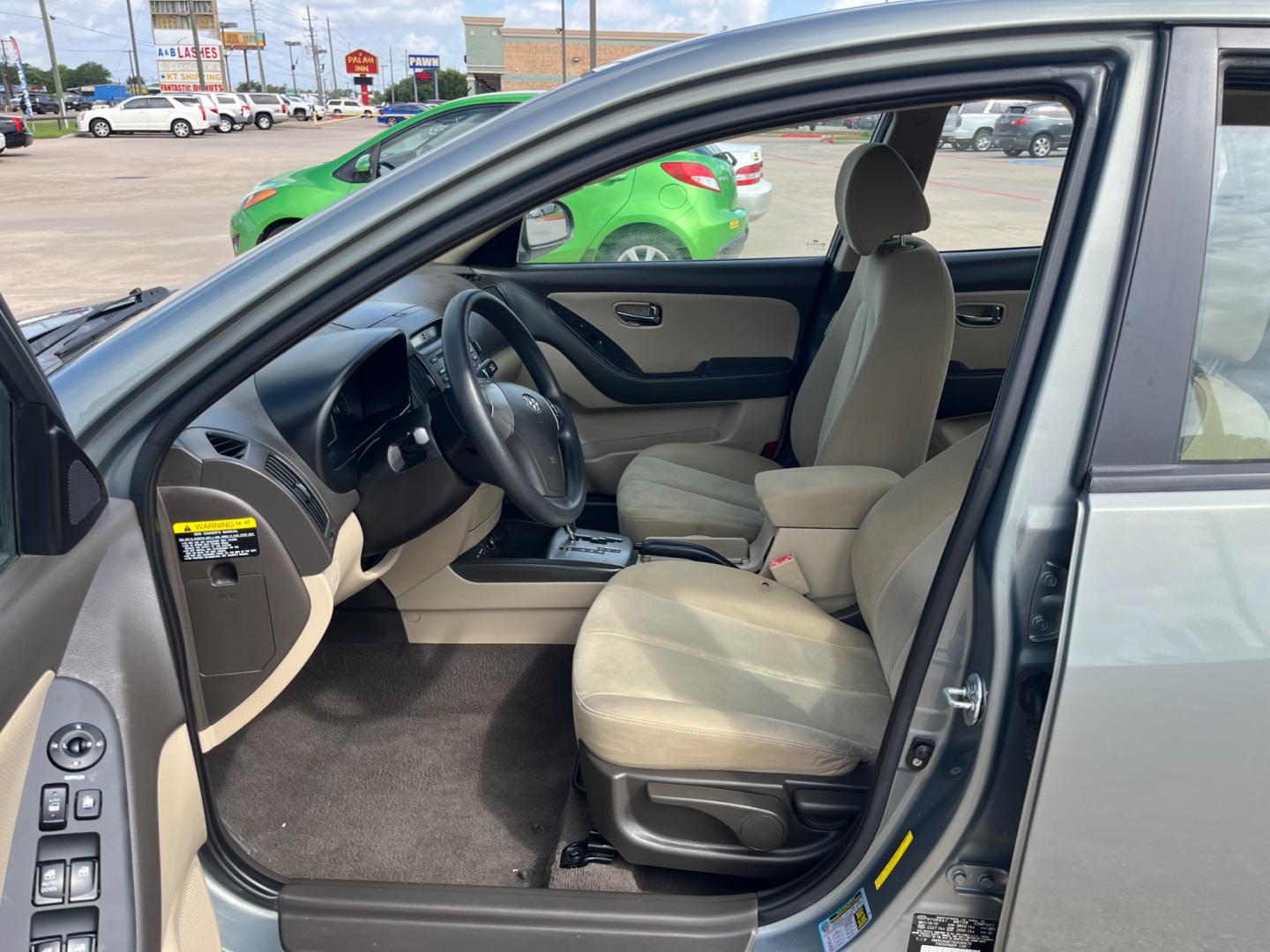 2010 green /gray Hyundai Elantra GLS (KMHDU4AD7AU) with an 2.0L L4 DOHC 16V engine, Automatic transmission, located at 14700 Tomball Parkway 249, Houston, TX, 77086, (281) 444-2200, 29.928619, -95.504074 - Photo#8