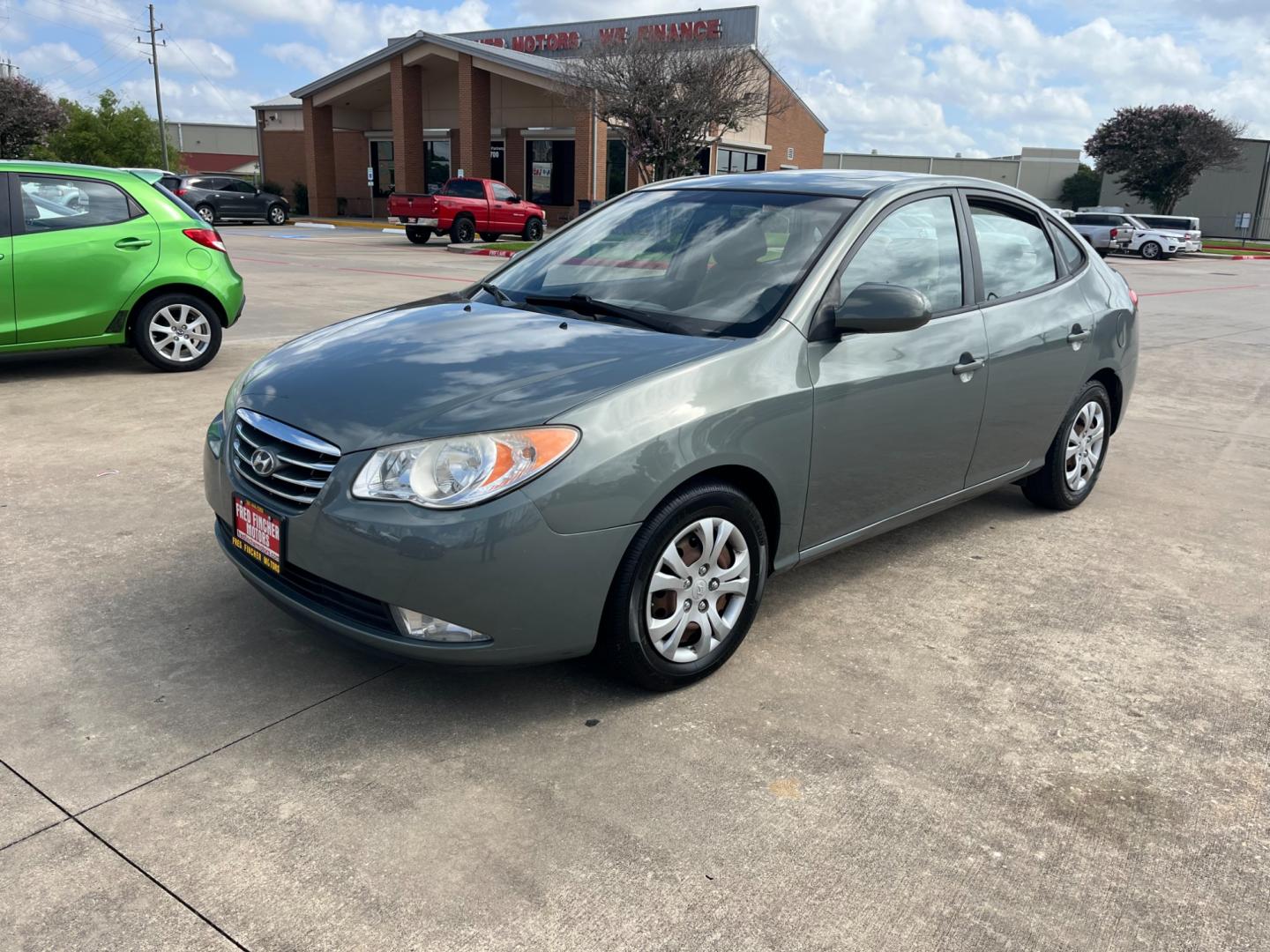 2010 green /gray Hyundai Elantra GLS (KMHDU4AD7AU) with an 2.0L L4 DOHC 16V engine, Automatic transmission, located at 14700 Tomball Parkway 249, Houston, TX, 77086, (281) 444-2200, 29.928619, -95.504074 - Photo#2