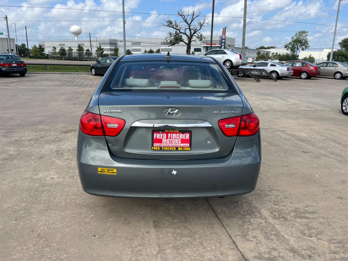 2010 green /gray Hyundai Elantra GLS (KMHDU4AD7AU) with an 2.0L L4 DOHC 16V engine, Automatic transmission, located at 14700 Tomball Parkway 249, Houston, TX, 77086, (281) 444-2200, 29.928619, -95.504074 - Photo#5