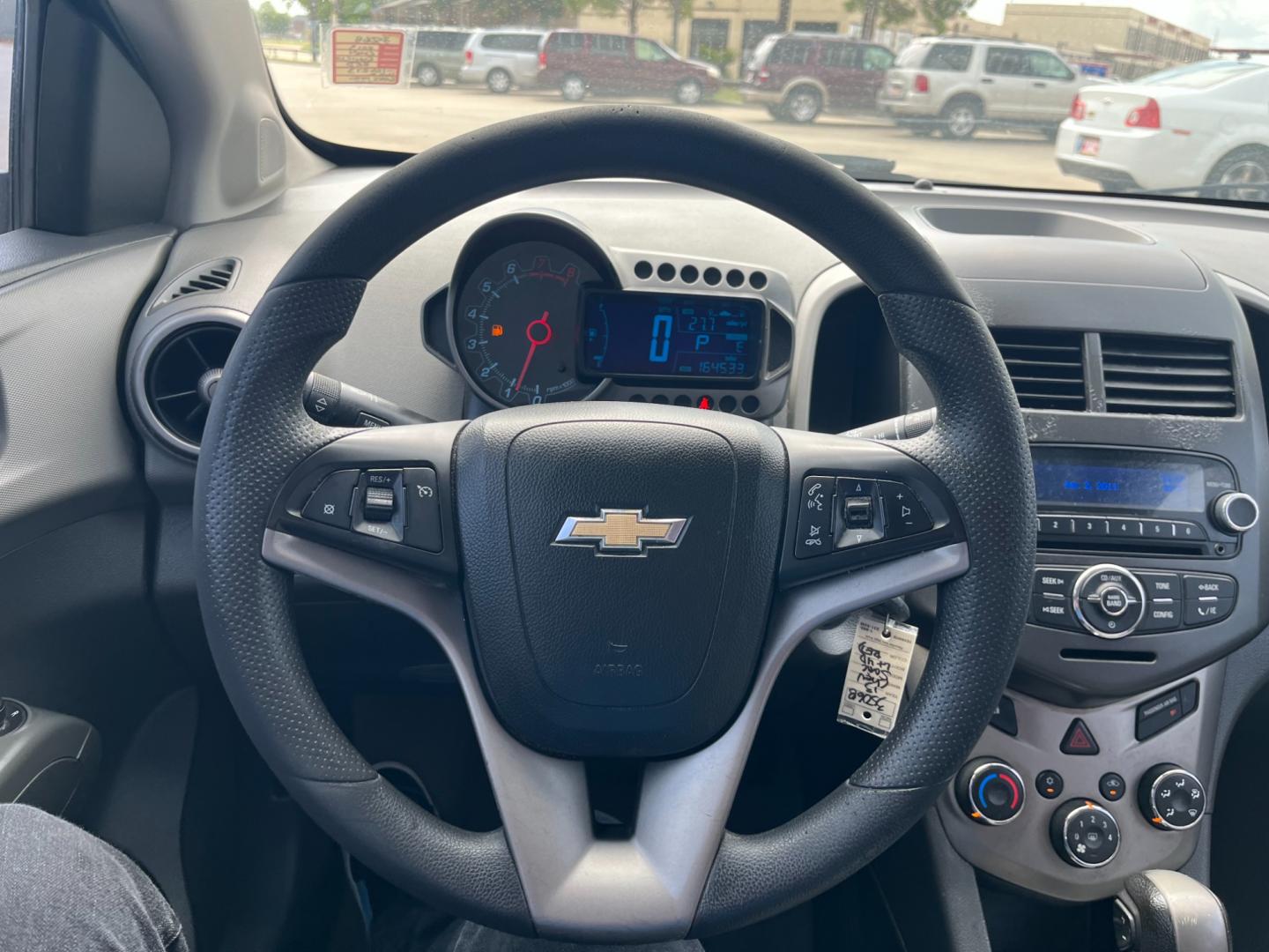 2013 red /black Chevrolet Sonic LT Auto 5-Door (1G1JC6SH3D4) with an 1.8L L4 DOHC 24V FFV engine, 6-Speed Automatic transmission, located at 14700 Tomball Parkway 249, Houston, TX, 77086, (281) 444-2200, 29.928619, -95.504074 - Photo#16