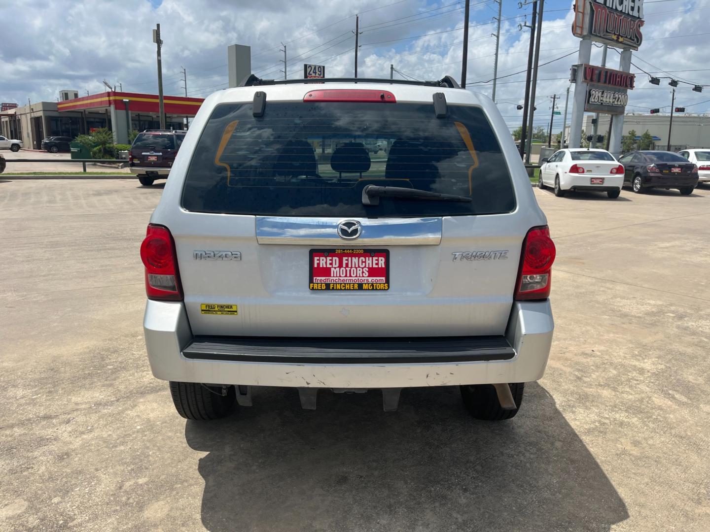 2009 silver /black Mazda Tribute i Grand Touring FWD (4F2CZ02769K) with an 2.3L L4 DOHC 24V engine, 4-Speed Automatic transmission, located at 14700 Tomball Parkway 249, Houston, TX, 77086, (281) 444-2200, 29.928619, -95.504074 - Photo#5