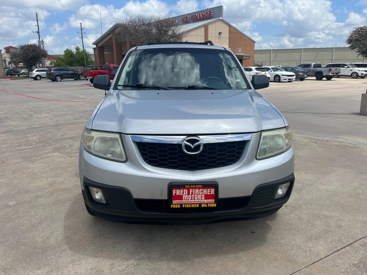 2009 silver /black Mazda Tribute i Grand Touring FWD (4F2CZ02769K) with an 2.3L L4 DOHC 24V engine, 4-Speed Automatic transmission, located at 14700 Tomball Parkway 249, Houston, TX, 77086, (281) 444-2200, 29.928619, -95.504074 - Photo#1