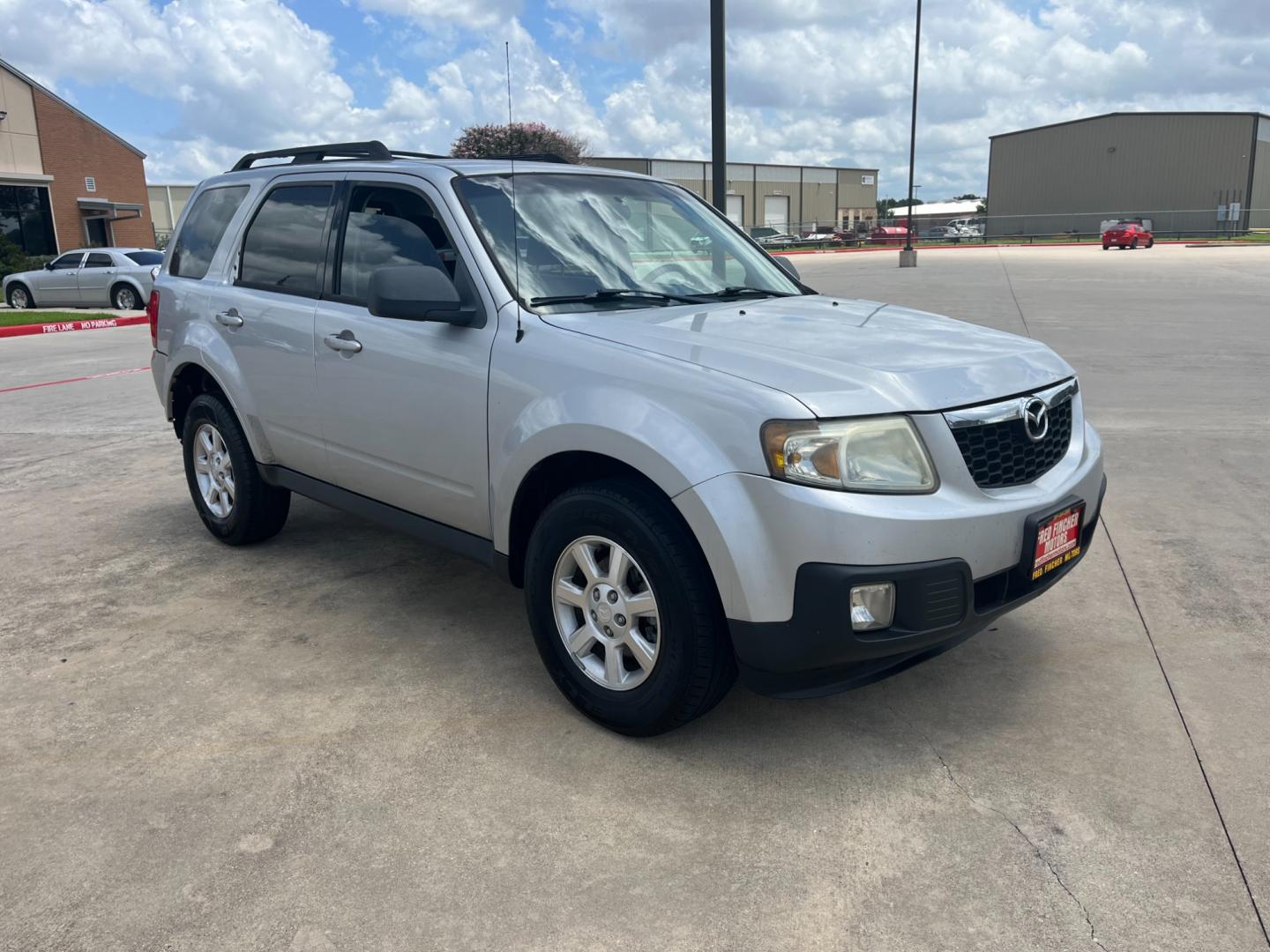 2009 silver /black Mazda Tribute i Grand Touring FWD (4F2CZ02769K) with an 2.3L L4 DOHC 24V engine, 4-Speed Automatic transmission, located at 14700 Tomball Parkway 249, Houston, TX, 77086, (281) 444-2200, 29.928619, -95.504074 - Photo#0