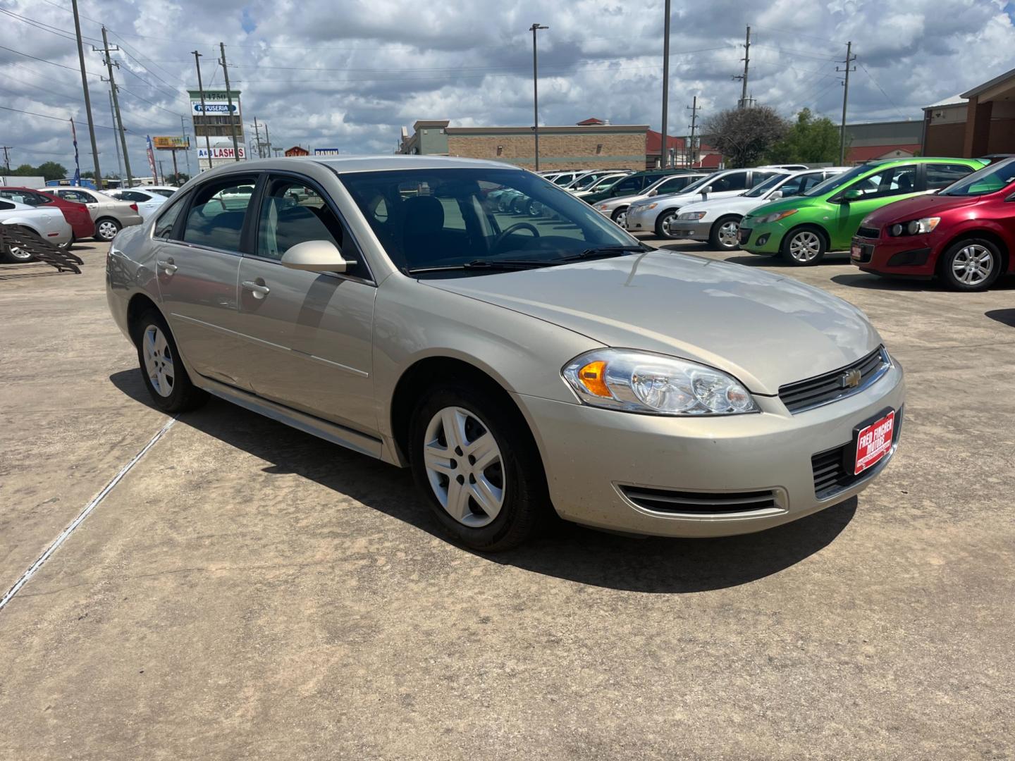 2010 GOLD /TAN Chevrolet Impala LS (2G1WA5EK7A1) with an 3.5L V6 OHV 16V FFV engine, 4-Speed Automatic Overdrive transmission, located at 14700 Tomball Parkway 249, Houston, TX, 77086, (281) 444-2200, 29.928619, -95.504074 - Photo#0