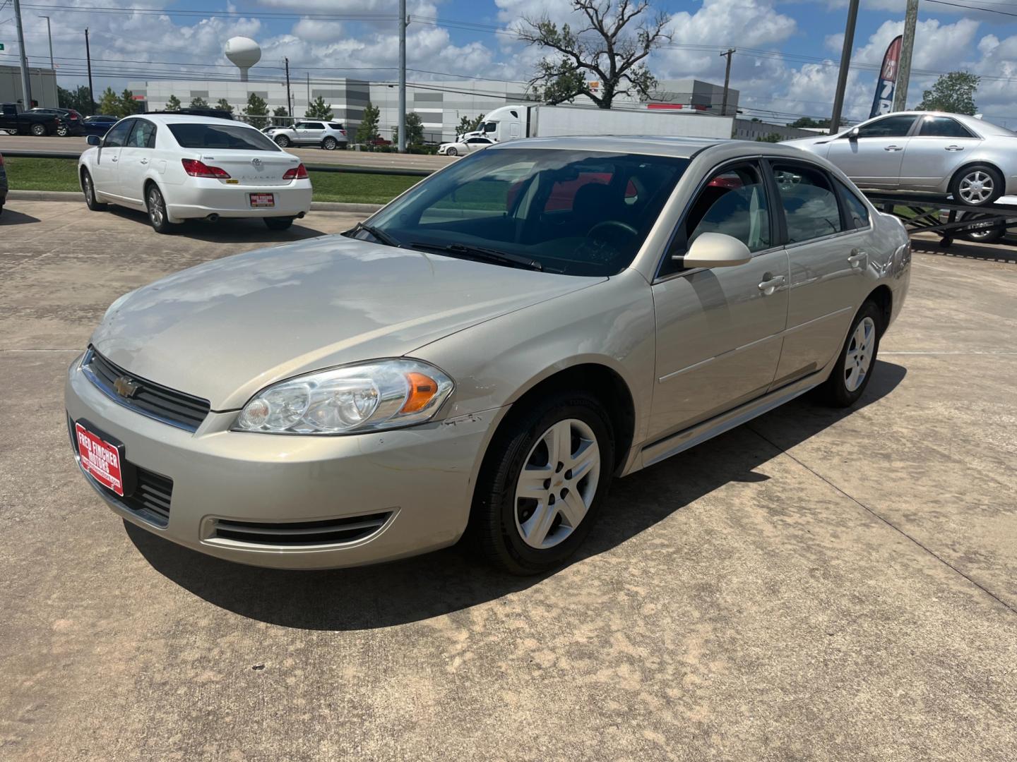 2010 GOLD /TAN Chevrolet Impala LS (2G1WA5EK7A1) with an 3.5L V6 OHV 16V FFV engine, 4-Speed Automatic Overdrive transmission, located at 14700 Tomball Parkway 249, Houston, TX, 77086, (281) 444-2200, 29.928619, -95.504074 - Photo#2