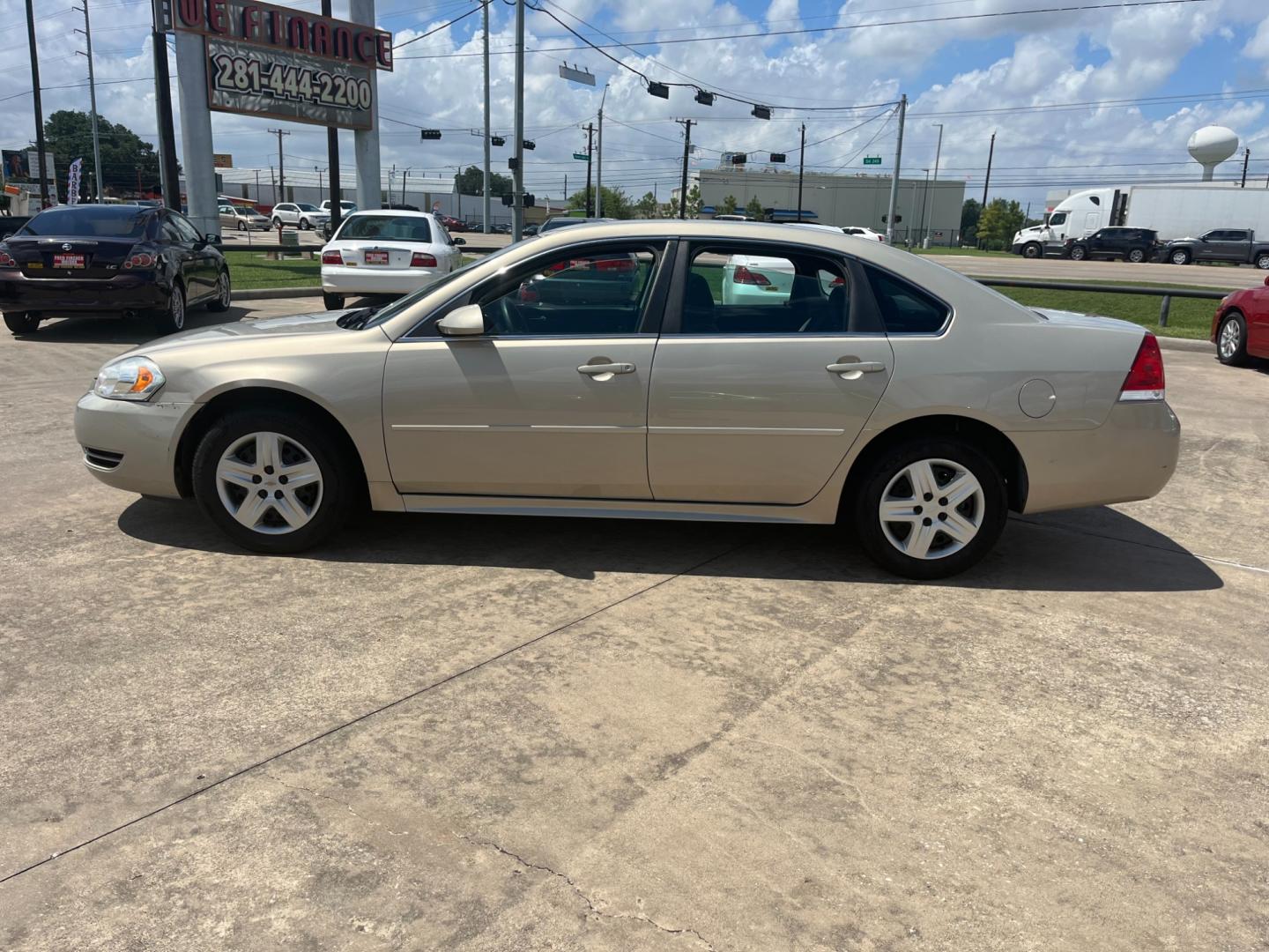 2010 GOLD /TAN Chevrolet Impala LS (2G1WA5EK7A1) with an 3.5L V6 OHV 16V FFV engine, 4-Speed Automatic Overdrive transmission, located at 14700 Tomball Parkway 249, Houston, TX, 77086, (281) 444-2200, 29.928619, -95.504074 - Photo#3