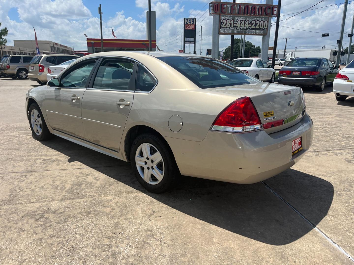 2010 GOLD /TAN Chevrolet Impala LS (2G1WA5EK7A1) with an 3.5L V6 OHV 16V FFV engine, 4-Speed Automatic Overdrive transmission, located at 14700 Tomball Parkway 249, Houston, TX, 77086, (281) 444-2200, 29.928619, -95.504074 - Photo#4