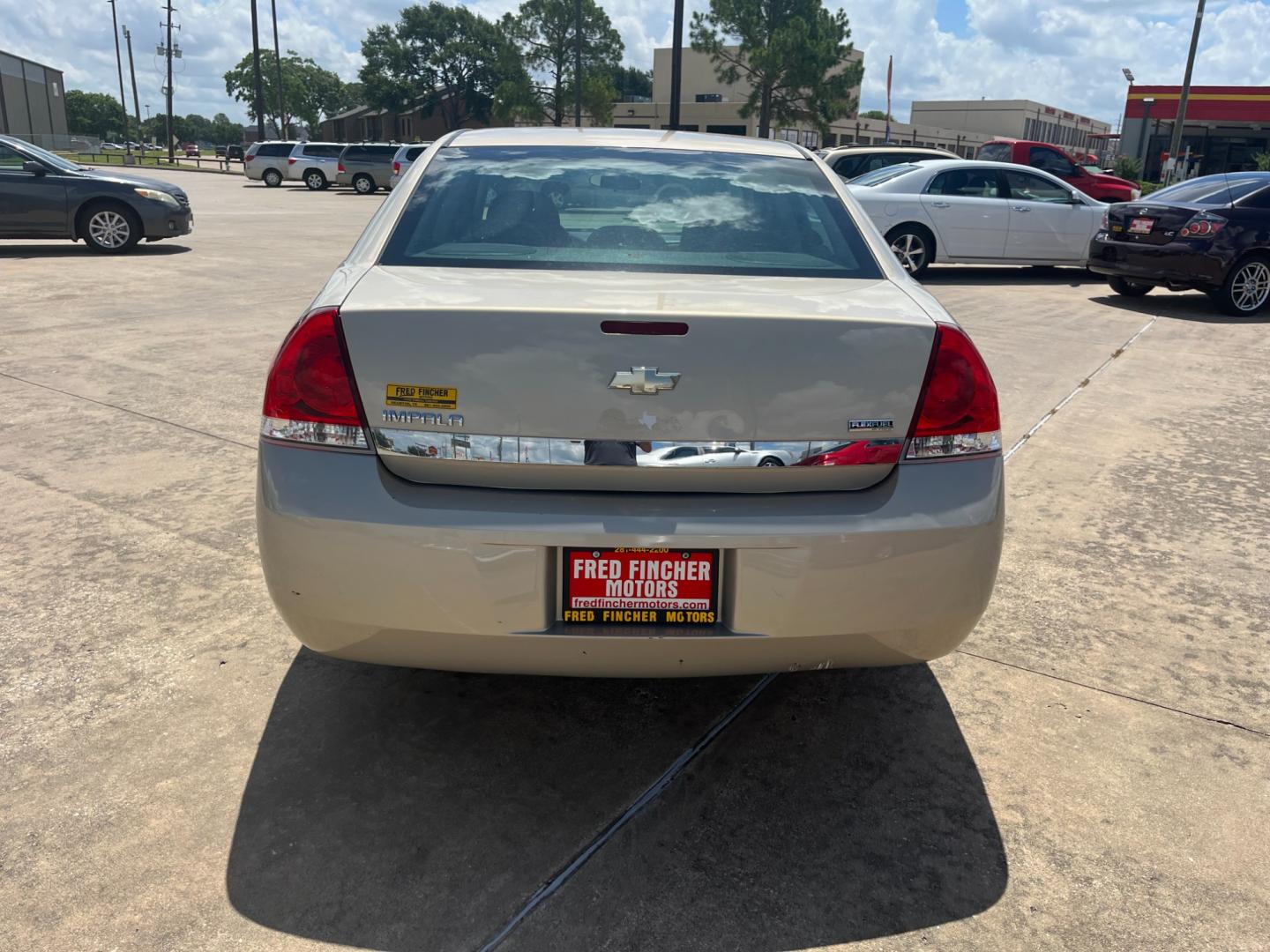 2010 GOLD /TAN Chevrolet Impala LS (2G1WA5EK7A1) with an 3.5L V6 OHV 16V FFV engine, 4-Speed Automatic Overdrive transmission, located at 14700 Tomball Parkway 249, Houston, TX, 77086, (281) 444-2200, 29.928619, -95.504074 - Photo#5