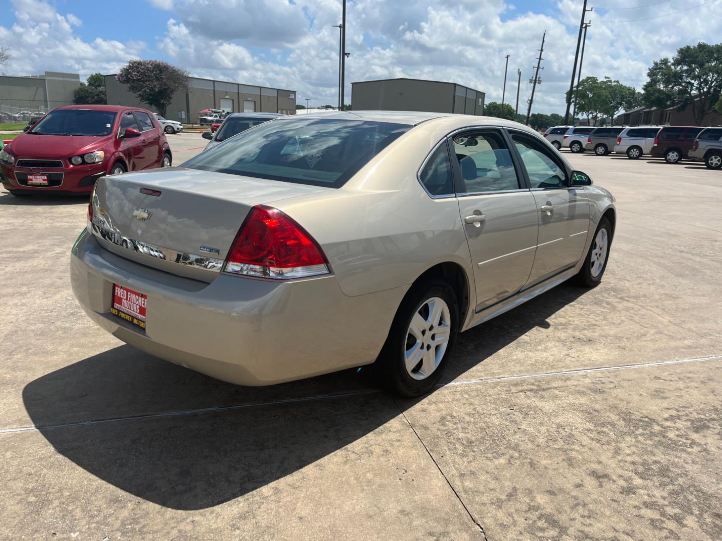 2010 GOLD /TAN Chevrolet Impala LS (2G1WA5EK7A1) with an 3.5L V6 OHV 16V FFV engine, 4-Speed Automatic Overdrive transmission, located at 14700 Tomball Parkway 249, Houston, TX, 77086, (281) 444-2200, 29.928619, -95.504074 - Photo#6