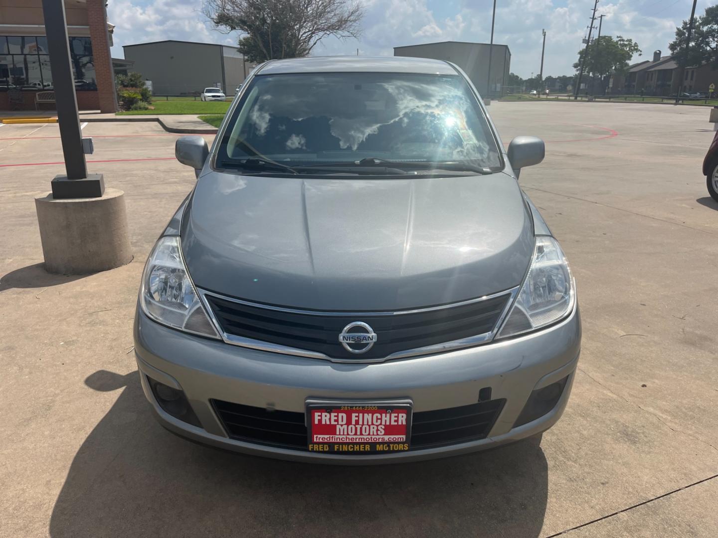 2012 GRAY /black Nissan Versa 1.8 SL Hatchback (3N1BC1CP6CK) with an 1.8L L4 DOHC 16V engine, Continuously Variable Transmission transmission, located at 14700 Tomball Parkway 249, Houston, TX, 77086, (281) 444-2200, 29.928619, -95.504074 - Photo#1