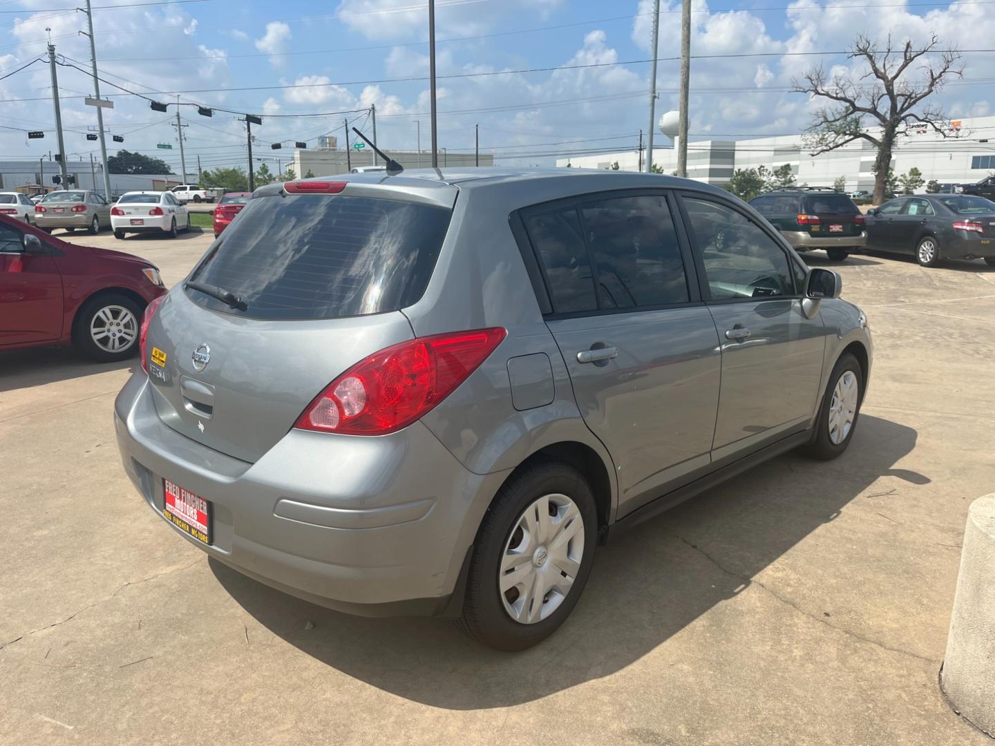 2012 GRAY /black Nissan Versa 1.8 SL Hatchback (3N1BC1CP6CK) with an 1.8L L4 DOHC 16V engine, Continuously Variable Transmission transmission, located at 14700 Tomball Parkway 249, Houston, TX, 77086, (281) 444-2200, 29.928619, -95.504074 - Photo#6