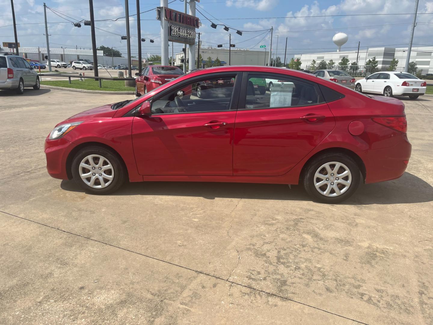 2014 red /black Hyundai Accent GLS 4-Door (KMHCT4AE4EU) with an 1.6L L4 DOHC 16V engine, Automatic transmission, located at 14700 Tomball Parkway 249, Houston, TX, 77086, (281) 444-2200, 29.928619, -95.504074 - Photo#3