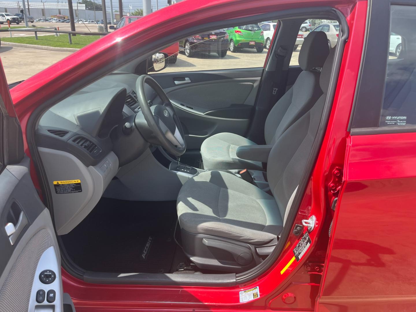 2014 red /black Hyundai Accent GLS 4-Door (KMHCT4AE4EU) with an 1.6L L4 DOHC 16V engine, Automatic transmission, located at 14700 Tomball Parkway 249, Houston, TX, 77086, (281) 444-2200, 29.928619, -95.504074 - Photo#8