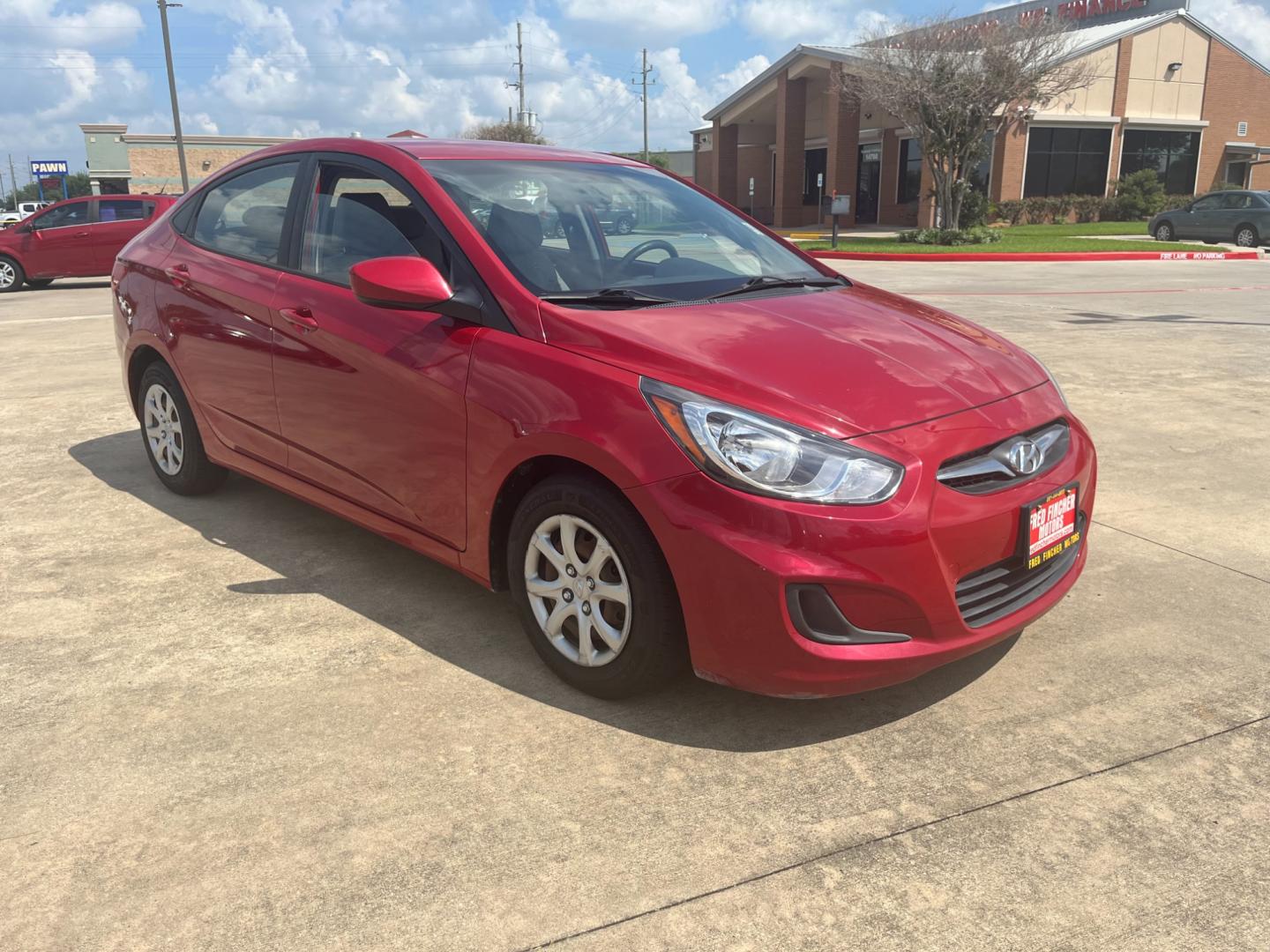 2014 red /black Hyundai Accent GLS 4-Door (KMHCT4AE4EU) with an 1.6L L4 DOHC 16V engine, Automatic transmission, located at 14700 Tomball Parkway 249, Houston, TX, 77086, (281) 444-2200, 29.928619, -95.504074 - Photo#0