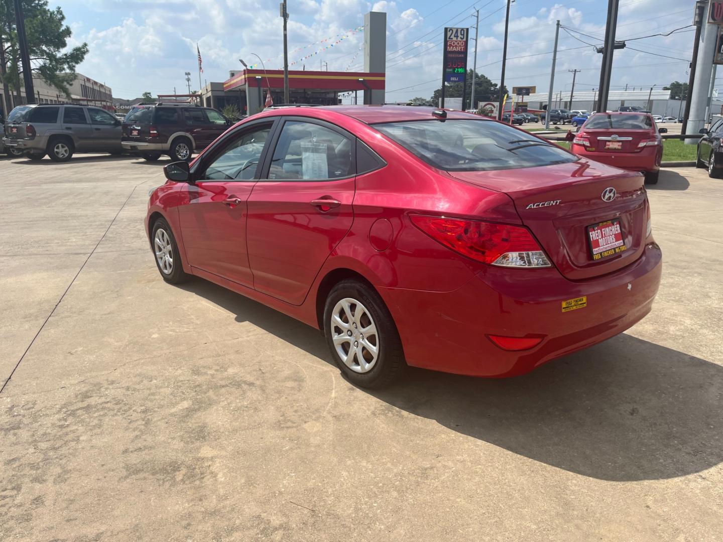 2014 red /black Hyundai Accent GLS 4-Door (KMHCT4AE4EU) with an 1.6L L4 DOHC 16V engine, Automatic transmission, located at 14700 Tomball Parkway 249, Houston, TX, 77086, (281) 444-2200, 29.928619, -95.504074 - Photo#4