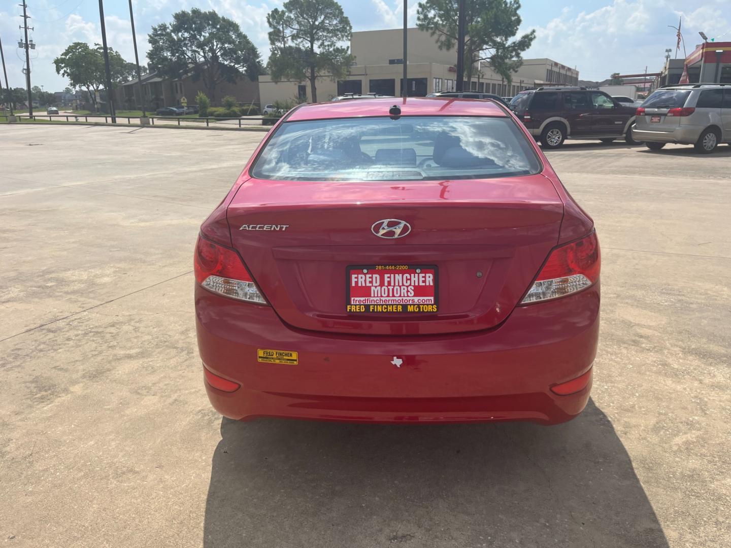 2014 red /black Hyundai Accent GLS 4-Door (KMHCT4AE4EU) with an 1.6L L4 DOHC 16V engine, Automatic transmission, located at 14700 Tomball Parkway 249, Houston, TX, 77086, (281) 444-2200, 29.928619, -95.504074 - Photo#5