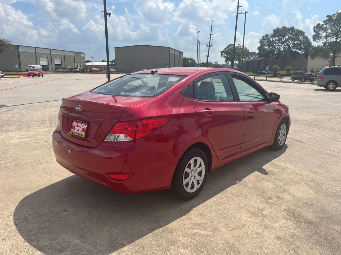 2014 red /black Hyundai Accent GLS 4-Door (KMHCT4AE4EU) with an 1.6L L4 DOHC 16V engine, Automatic transmission, located at 14700 Tomball Parkway 249, Houston, TX, 77086, (281) 444-2200, 29.928619, -95.504074 - Photo#6