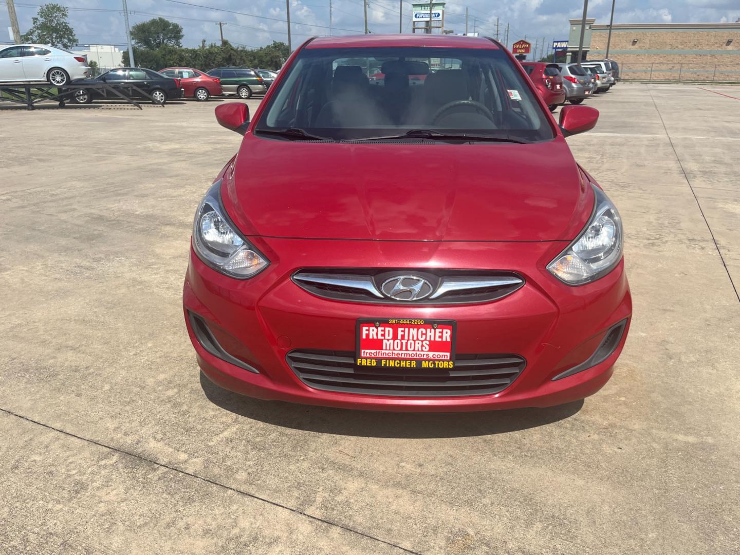 2014 red /black Hyundai Accent GLS 4-Door (KMHCT4AE4EU) with an 1.6L L4 DOHC 16V engine, Automatic transmission, located at 14700 Tomball Parkway 249, Houston, TX, 77086, (281) 444-2200, 29.928619, -95.504074 - Photo#1