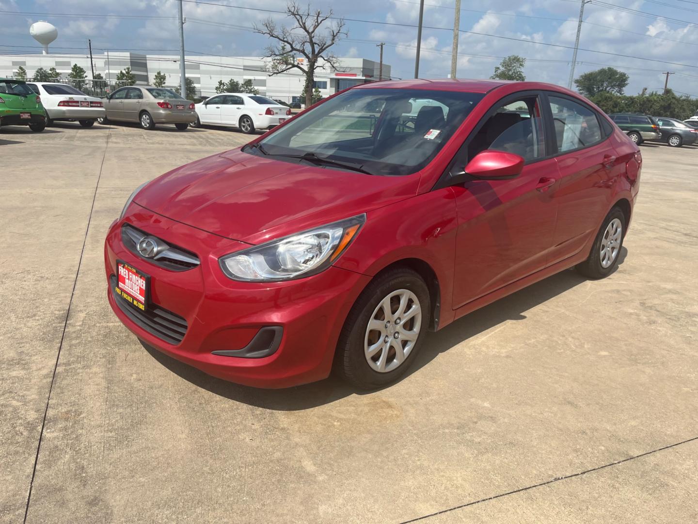 2014 red /black Hyundai Accent GLS 4-Door (KMHCT4AE4EU) with an 1.6L L4 DOHC 16V engine, Automatic transmission, located at 14700 Tomball Parkway 249, Houston, TX, 77086, (281) 444-2200, 29.928619, -95.504074 - Photo#2