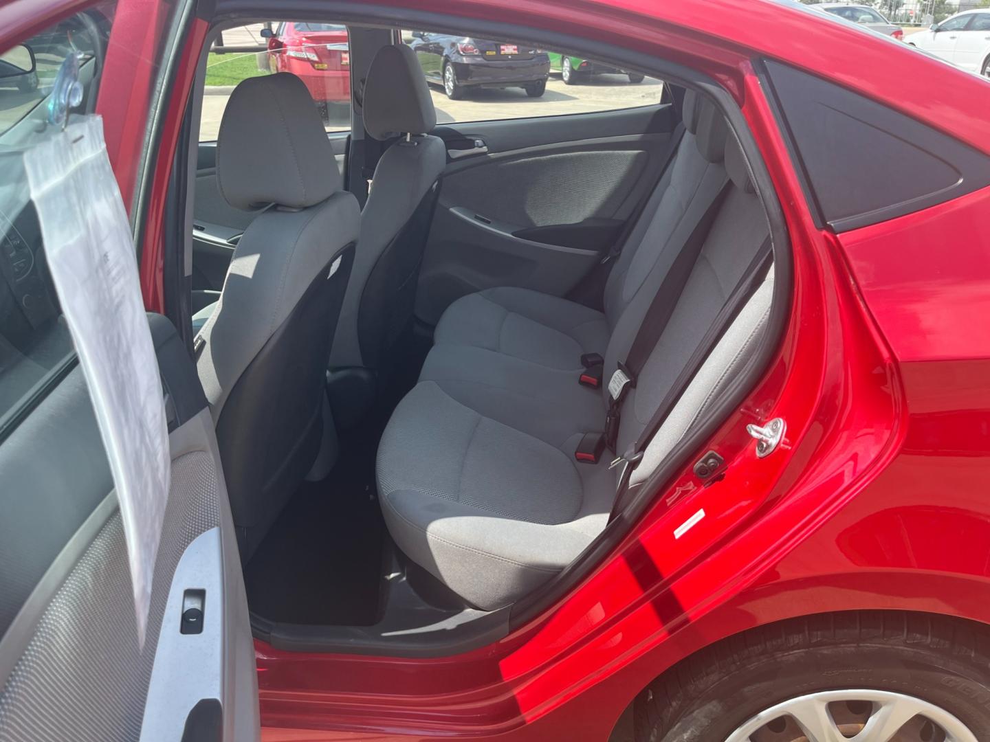 2014 red /black Hyundai Accent GLS 4-Door (KMHCT4AE4EU) with an 1.6L L4 DOHC 16V engine, Automatic transmission, located at 14700 Tomball Parkway 249, Houston, TX, 77086, (281) 444-2200, 29.928619, -95.504074 - Photo#9