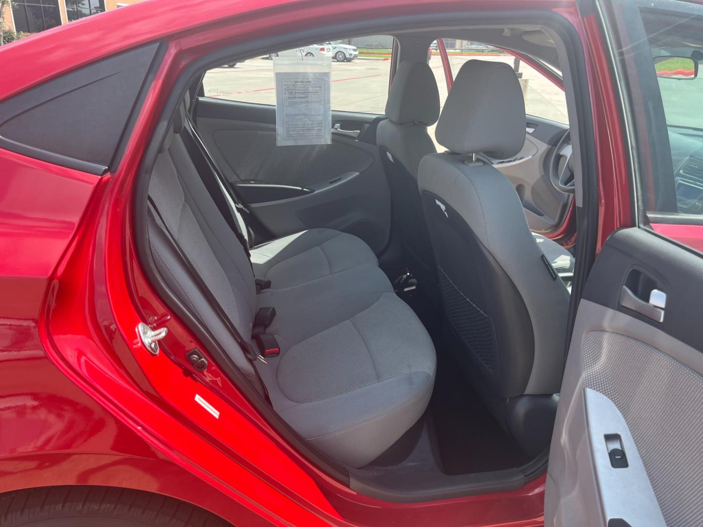 2014 red /black Hyundai Accent GLS 4-Door (KMHCT4AE4EU) with an 1.6L L4 DOHC 16V engine, Automatic transmission, located at 14700 Tomball Parkway 249, Houston, TX, 77086, (281) 444-2200, 29.928619, -95.504074 - Photo#12