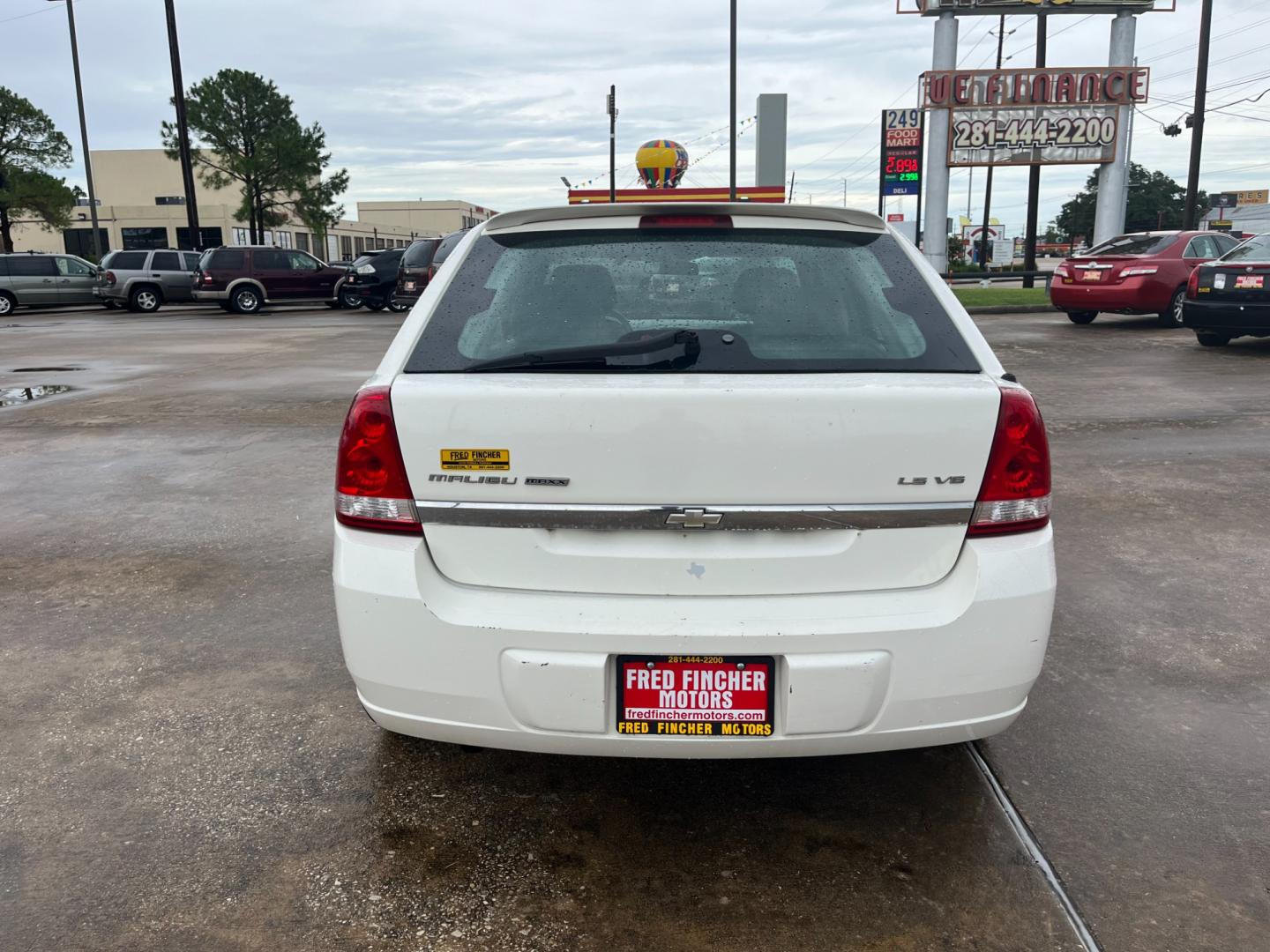 2005 white /TAN Chevrolet Malibu MAXX LS (1G1ZT62875F) with an 3.5L V6 OHV 12V engine, 4-Speed Automatic Overdrive transmission, located at 14700 Tomball Parkway 249, Houston, TX, 77086, (281) 444-2200, 29.928619, -95.504074 - Photo#5