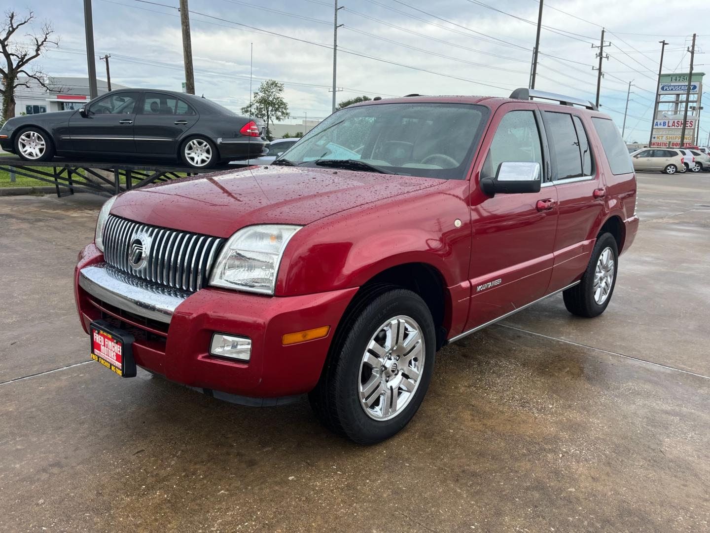 2008 red /tan Mercury Mountaineer (4M2EU38848U) , Automatic transmission, located at 14700 Tomball Parkway 249, Houston, TX, 77086, (281) 444-2200, 29.928619, -95.504074 - Photo#2