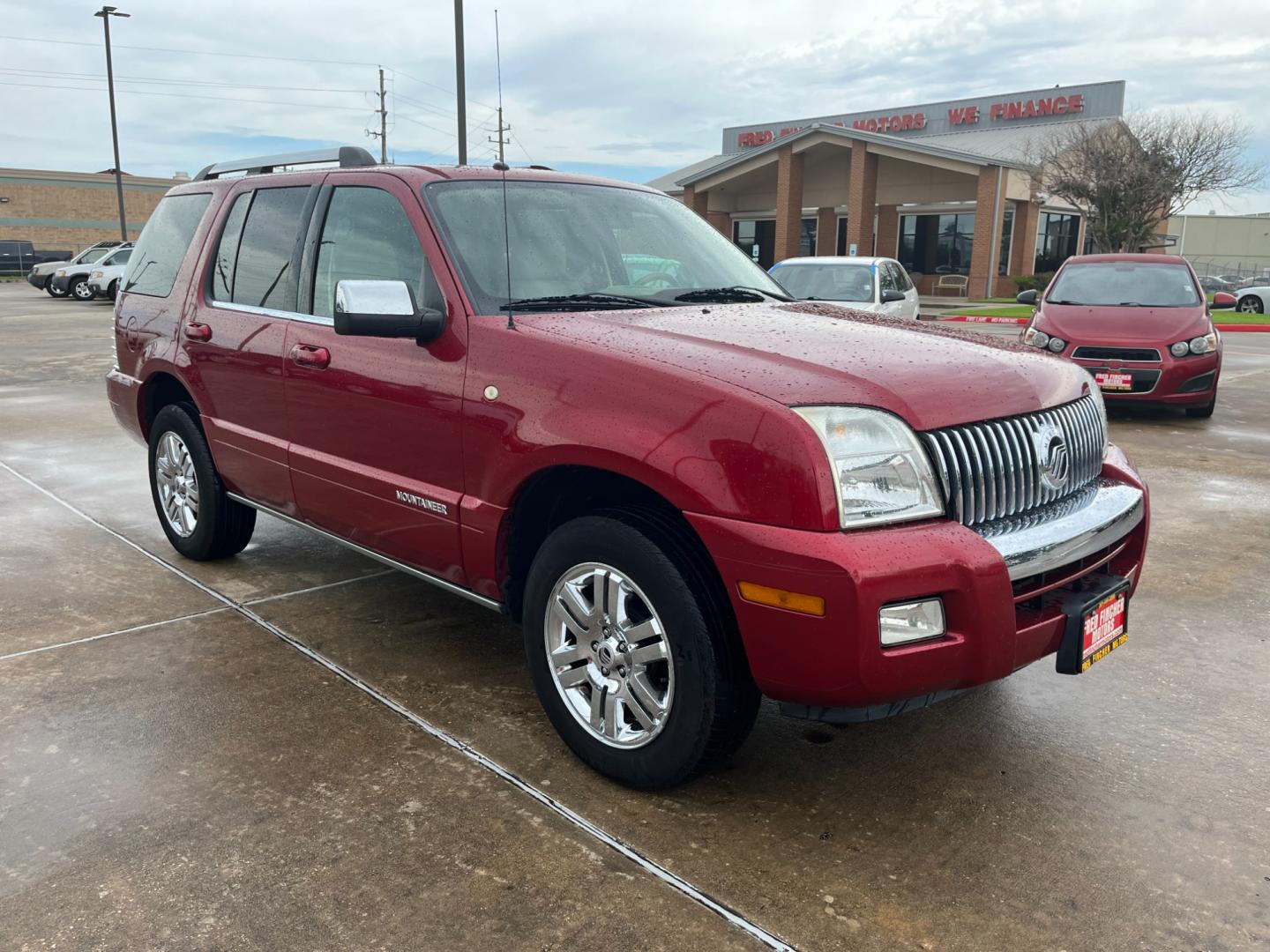 2008 red /tan Mercury Mountaineer (4M2EU38848U) , Automatic transmission, located at 14700 Tomball Parkway 249, Houston, TX, 77086, (281) 444-2200, 29.928619, -95.504074 - Photo#0