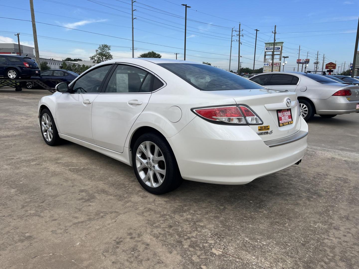 2013 Mazda MAZDA6 i Touring Plus (1YVHZ8EH3D5) with an 2.5L L4 DOHC 16V engine, 6-Speed Automatic transmission, located at 14700 Tomball Parkway 249, Houston, TX, 77086, (281) 444-2200, 29.928619, -95.504074 - Photo#3