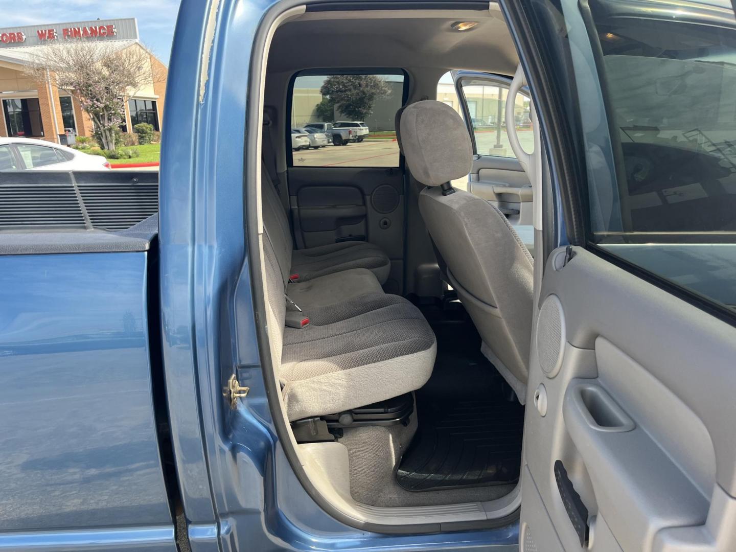 2004 Dodge Ram 1500 Laramie Quad Cab 2WD (1D7HA18DX4S) with an 5.7L V8 OHV 16V engine, AUTOMATIC transmission, located at 14700 Tomball Parkway 249, Houston, TX, 77086, (281) 444-2200, 29.928619, -95.504074 - Photo#12