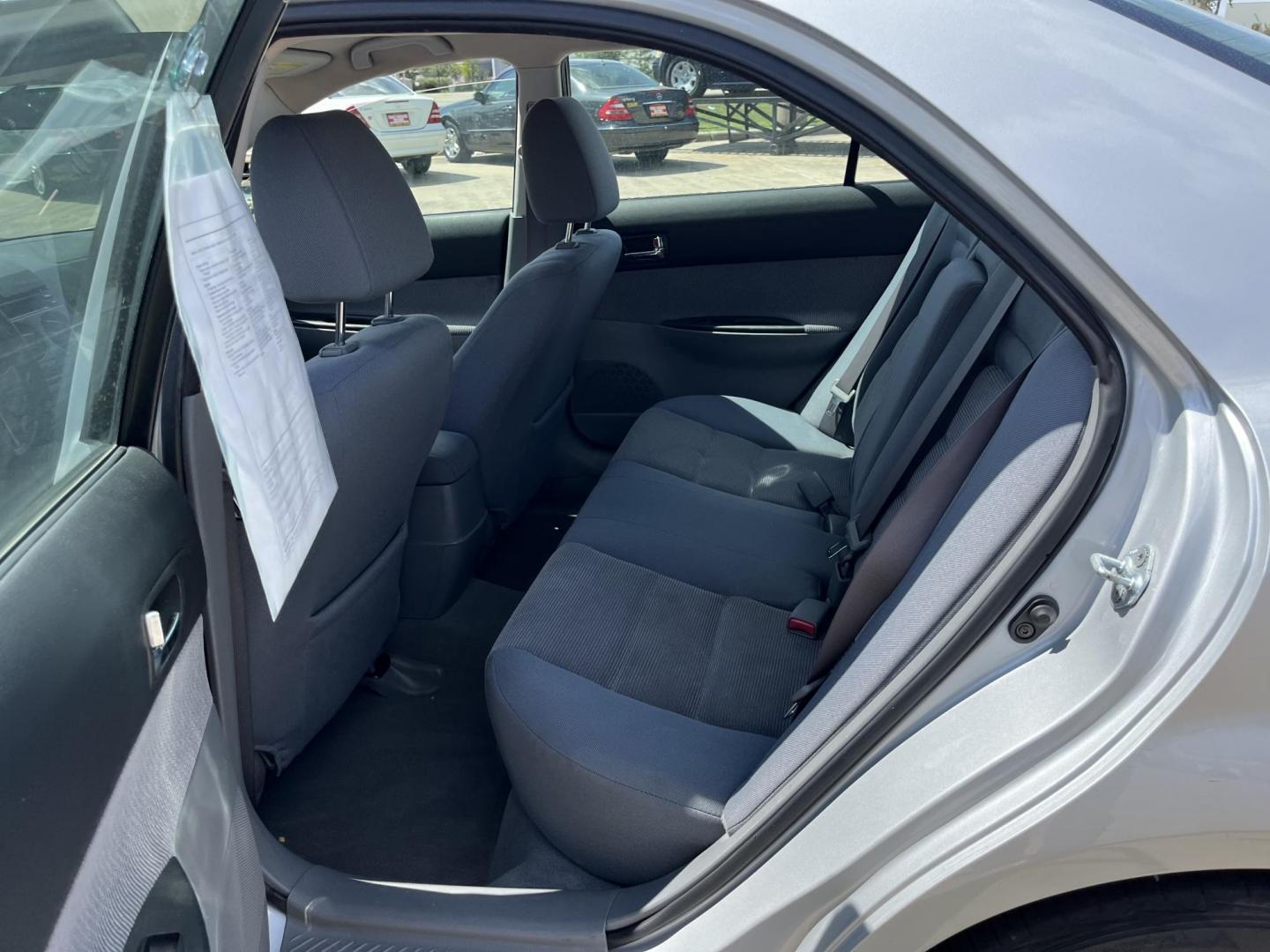 2004 Mazda MAZDA6 i (1YVFP80C845) with an 2.3L L4 DOHC 16V engine, 5-Speed Automatic Overdrive transmission, located at 14700 Tomball Parkway 249, Houston, TX, 77086, (281) 444-2200, 29.928619, -95.504074 - Photo#12