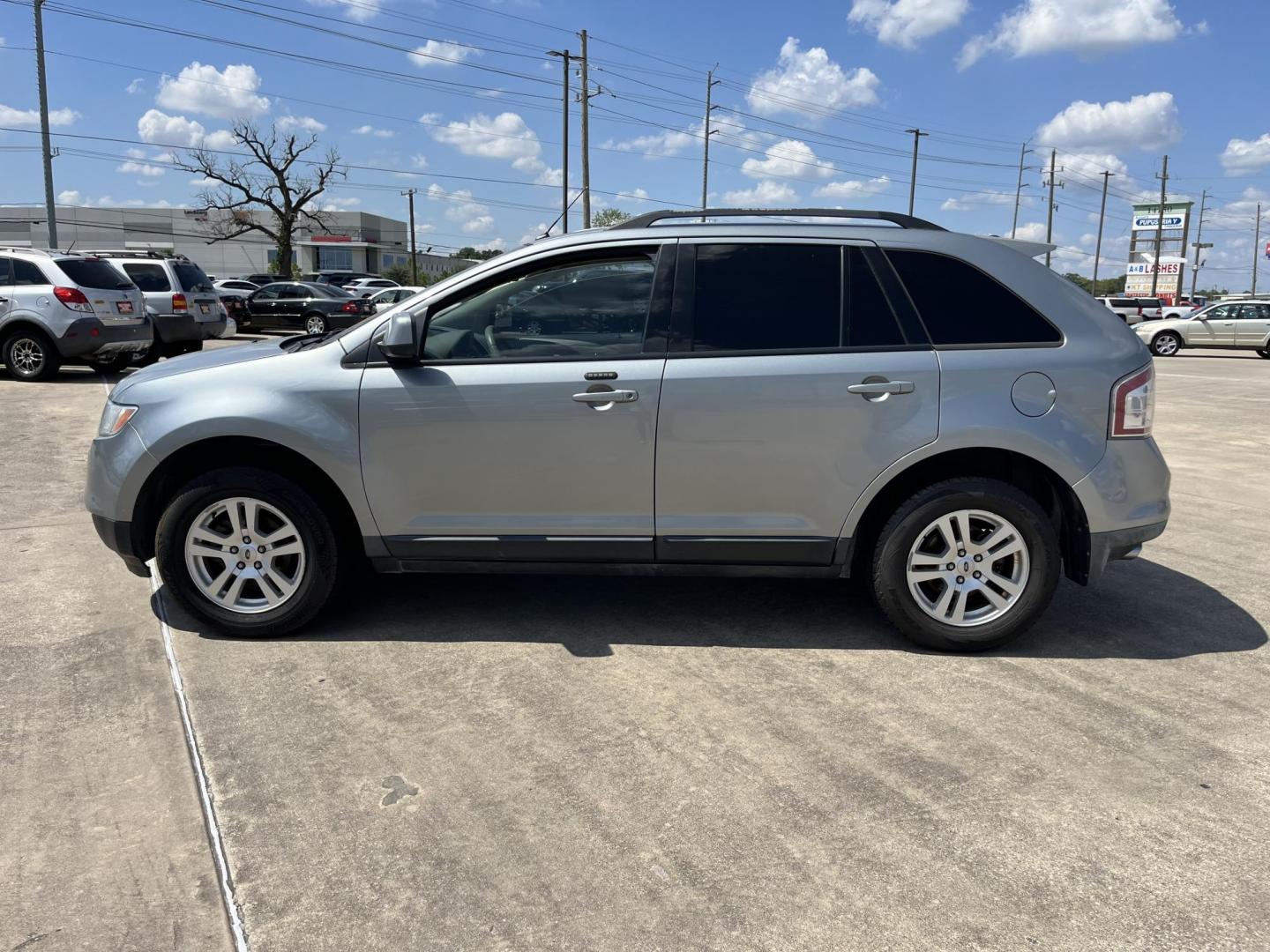 2007 blue /TAN Ford Edge SEL FWD (2FMDK38CX7B) with an 3.5L V6 DOHC 24V engine, 6-Speed Automatic Overdrive transmission, located at 14700 Tomball Parkway 249, Houston, TX, 77086, (281) 444-2200, 29.928619, -95.504074 - Photo#1