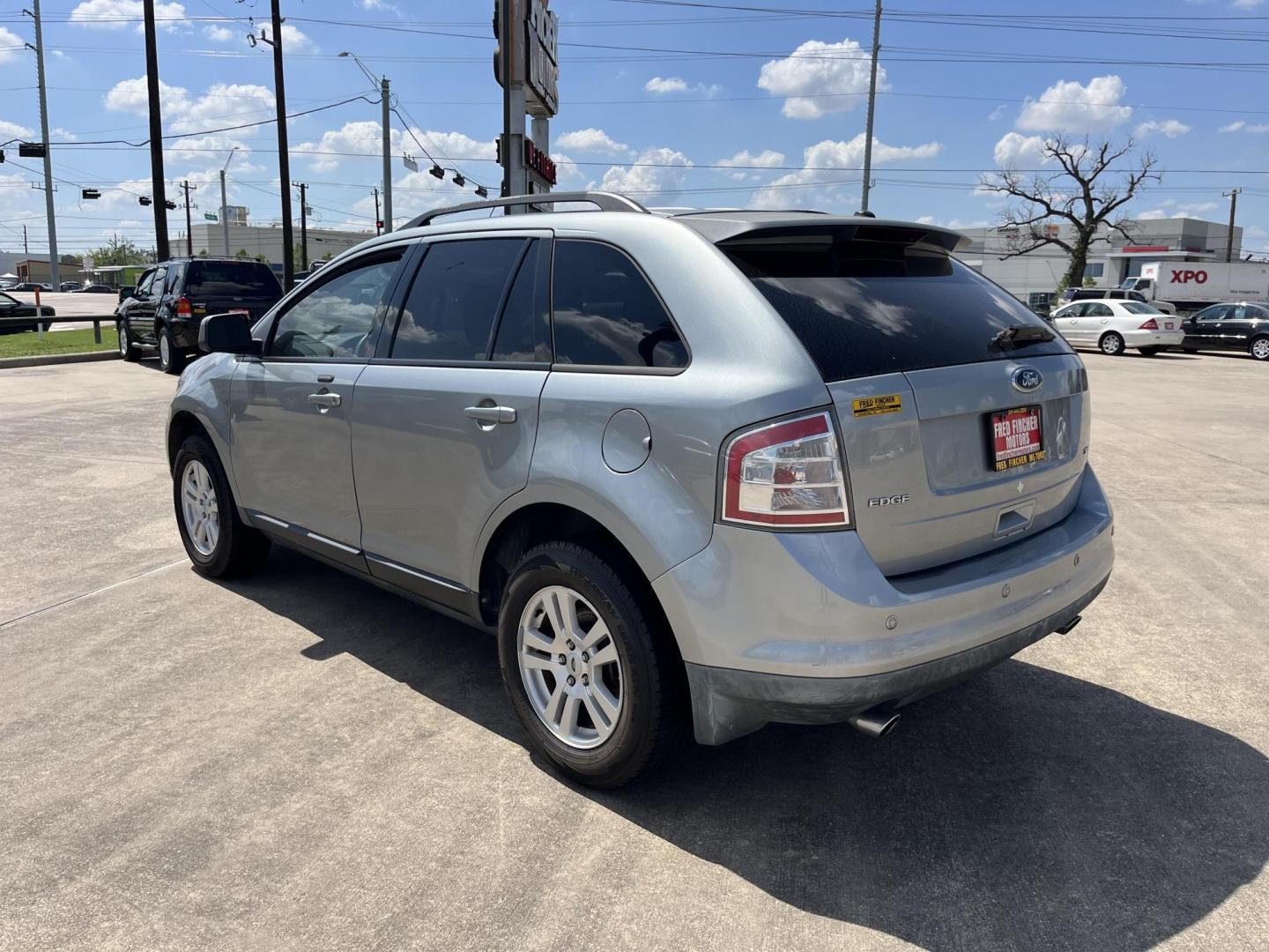 2007 blue /TAN Ford Edge SEL FWD (2FMDK38CX7B) with an 3.5L V6 DOHC 24V engine, 6-Speed Automatic Overdrive transmission, located at 14700 Tomball Parkway 249, Houston, TX, 77086, (281) 444-2200, 29.928619, -95.504074 - Photo#4