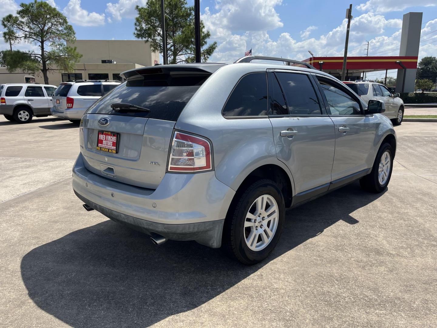 2007 blue /TAN Ford Edge SEL FWD (2FMDK38CX7B) with an 3.5L V6 DOHC 24V engine, 6-Speed Automatic Overdrive transmission, located at 14700 Tomball Parkway 249, Houston, TX, 77086, (281) 444-2200, 29.928619, -95.504074 - Photo#6