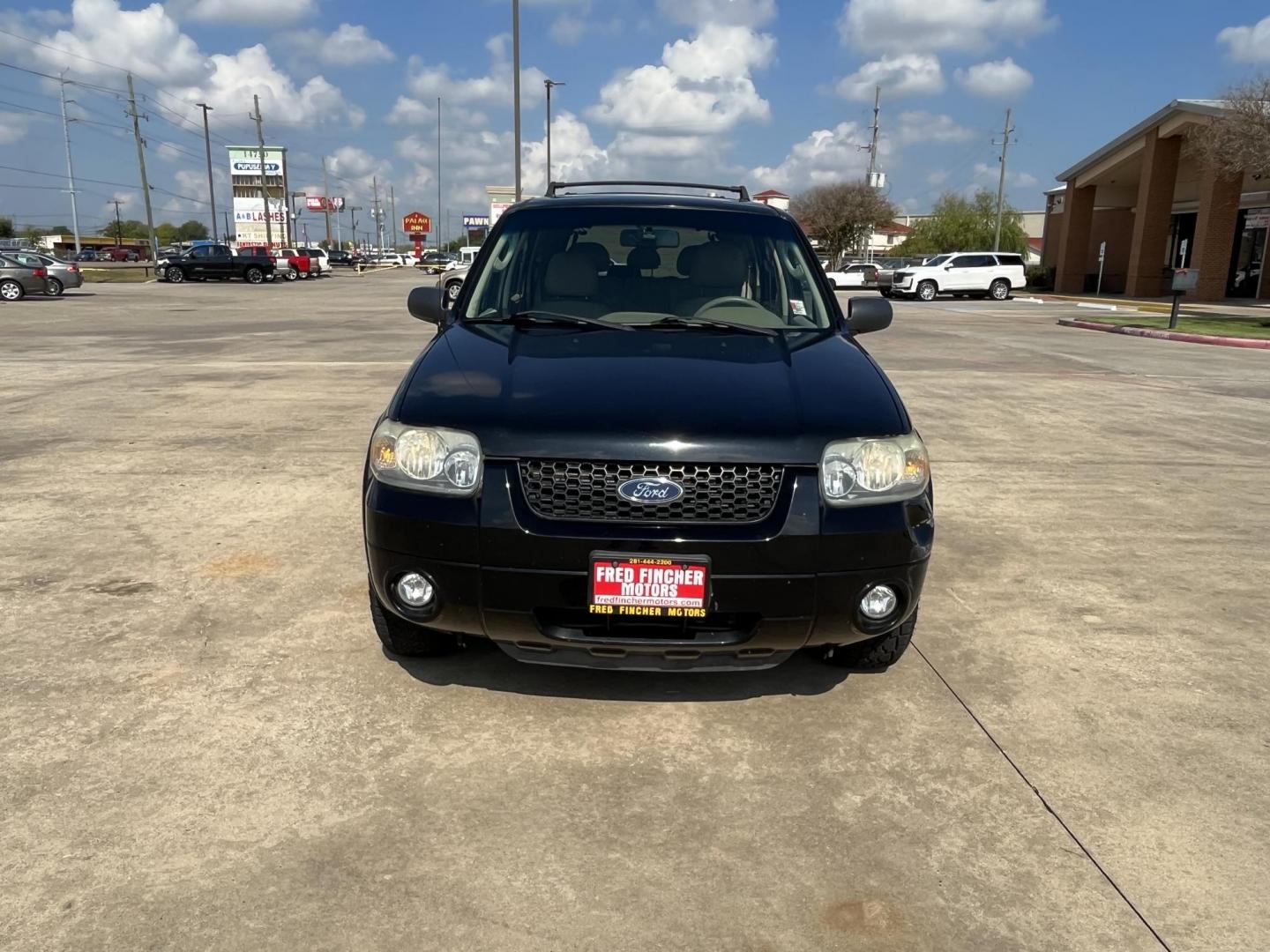 2007 Black /TAN Ford Escape XLT 4WD (1FMCU93137K) with an 3.0L V6 DOHC 24V engine, 4-Speed Automatic Overdrive transmission, located at 14700 Tomball Parkway 249, Houston, TX, 77086, (281) 444-2200, 29.928619, -95.504074 - Photo#1