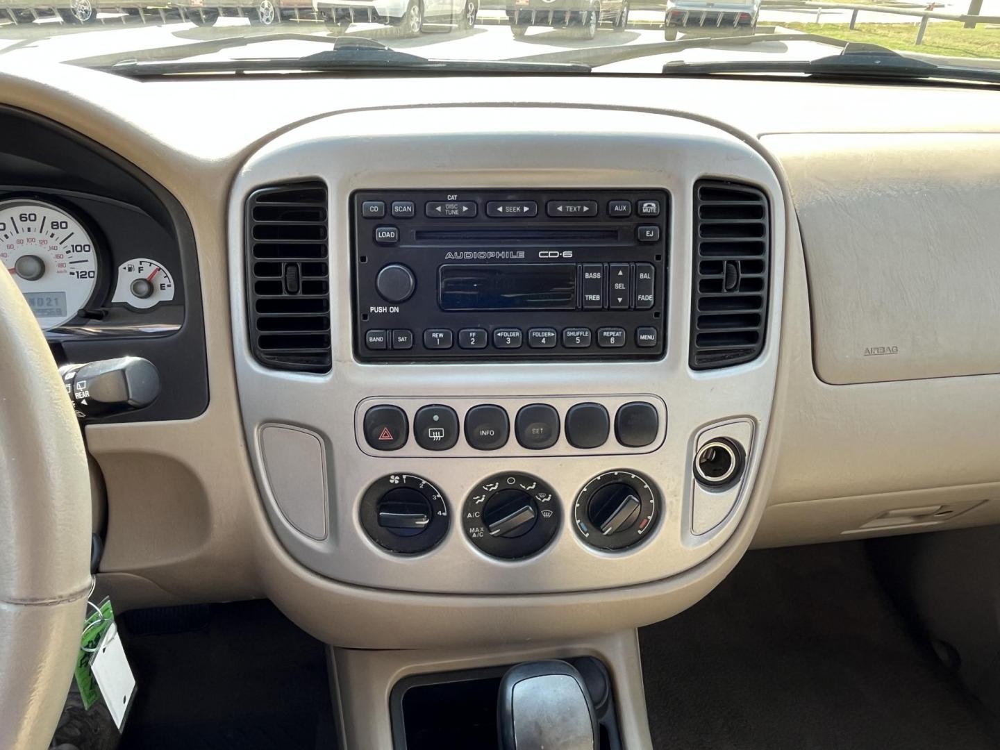 2007 Black /TAN Ford Escape XLT 4WD (1FMCU93137K) with an 3.0L V6 DOHC 24V engine, 4-Speed Automatic Overdrive transmission, located at 14700 Tomball Parkway 249, Houston, TX, 77086, (281) 444-2200, 29.928619, -95.504074 - Photo#15