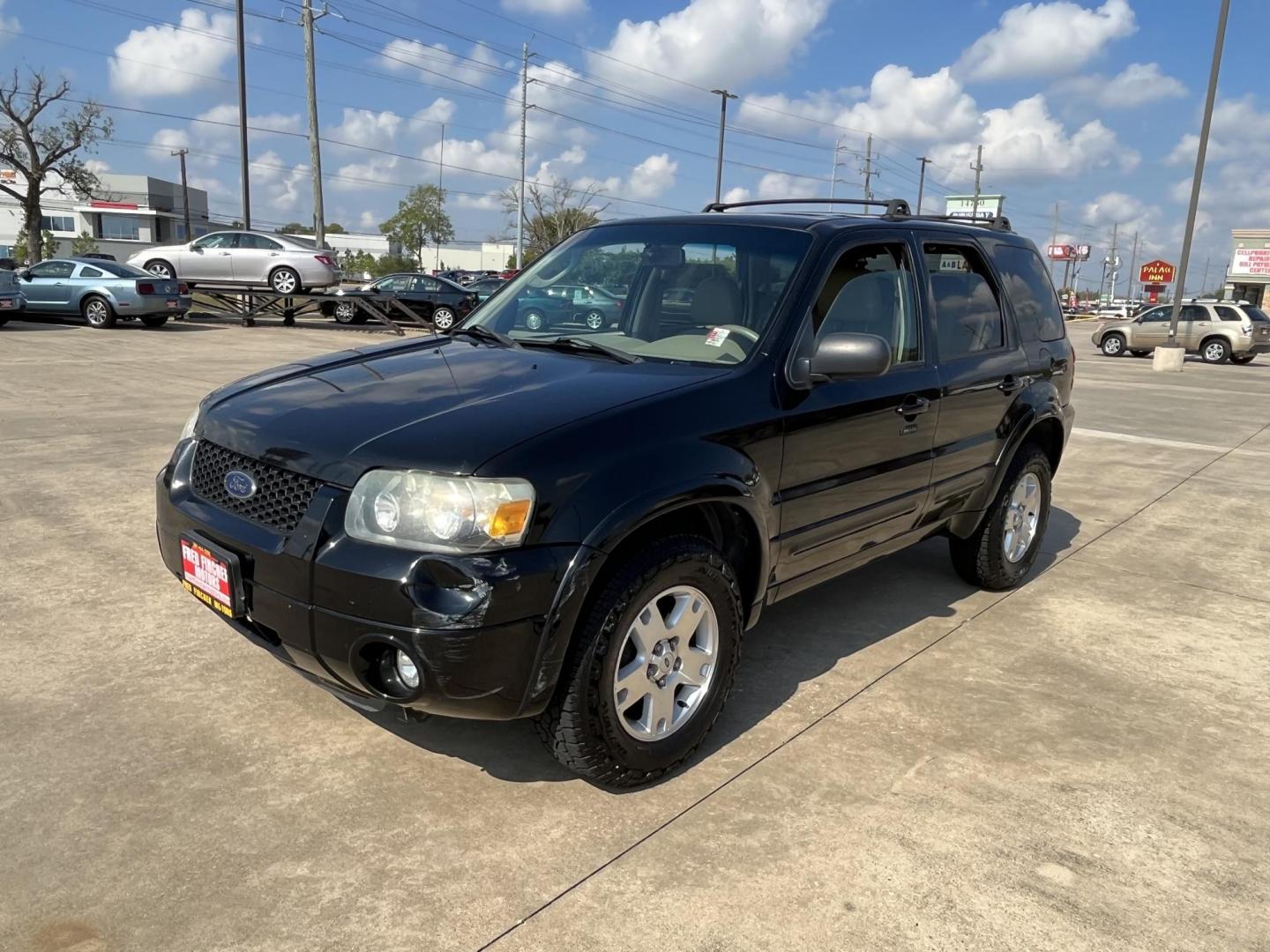 2007 Black /TAN Ford Escape XLT 4WD (1FMCU93137K) with an 3.0L V6 DOHC 24V engine, 4-Speed Automatic Overdrive transmission, located at 14700 Tomball Parkway 249, Houston, TX, 77086, (281) 444-2200, 29.928619, -95.504074 - Photo#2