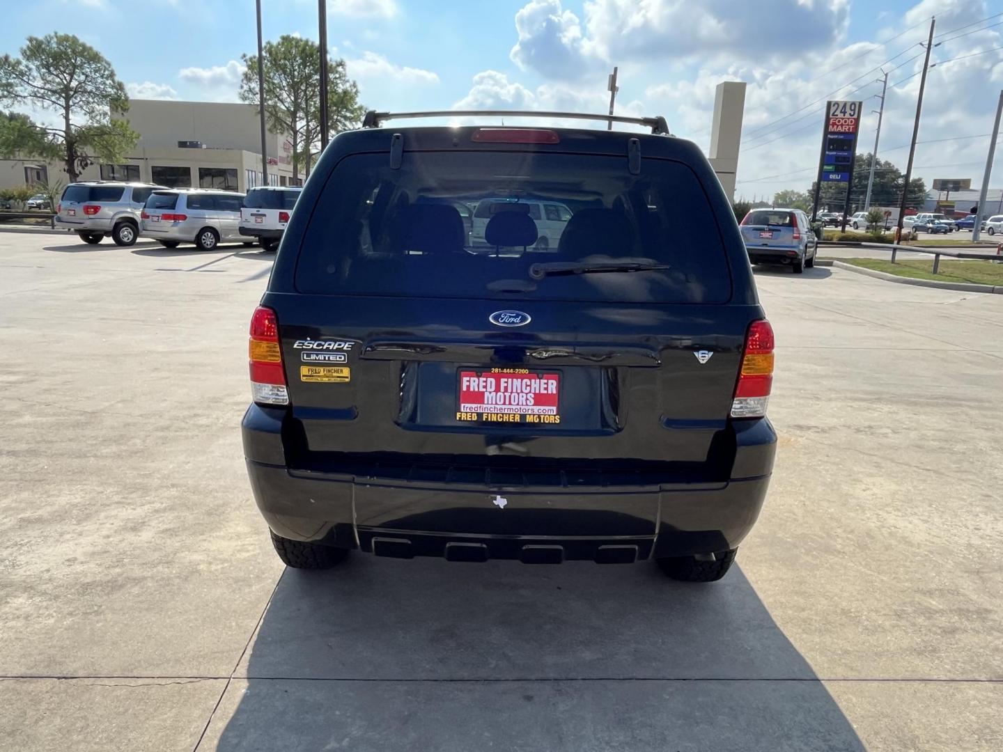 2007 Black /TAN Ford Escape XLT 4WD (1FMCU93137K) with an 3.0L V6 DOHC 24V engine, 4-Speed Automatic Overdrive transmission, located at 14700 Tomball Parkway 249, Houston, TX, 77086, (281) 444-2200, 29.928619, -95.504074 - Photo#5