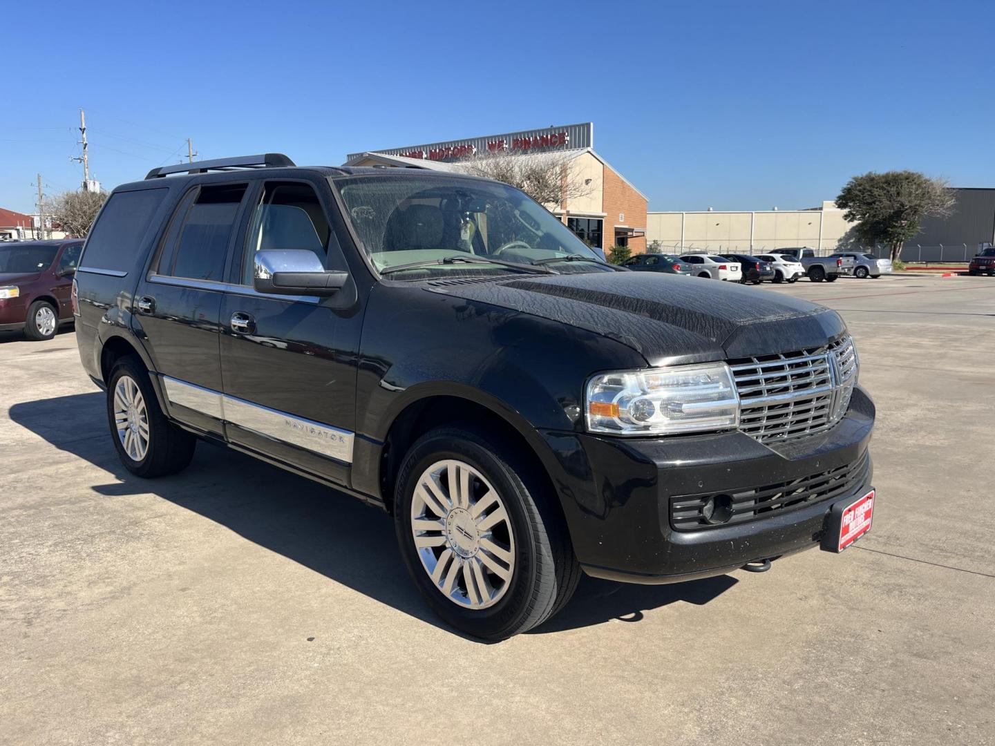 2012 black /TAN Lincoln Navigator 2WD (5LMJJ2H52CE) with an 5.4L V8 SOHC 24V engine, 6-Speed Automatic transmission, located at 14700 Tomball Parkway 249, Houston, TX, 77086, (281) 444-2200, 29.928619, -95.504074 - Photo#0