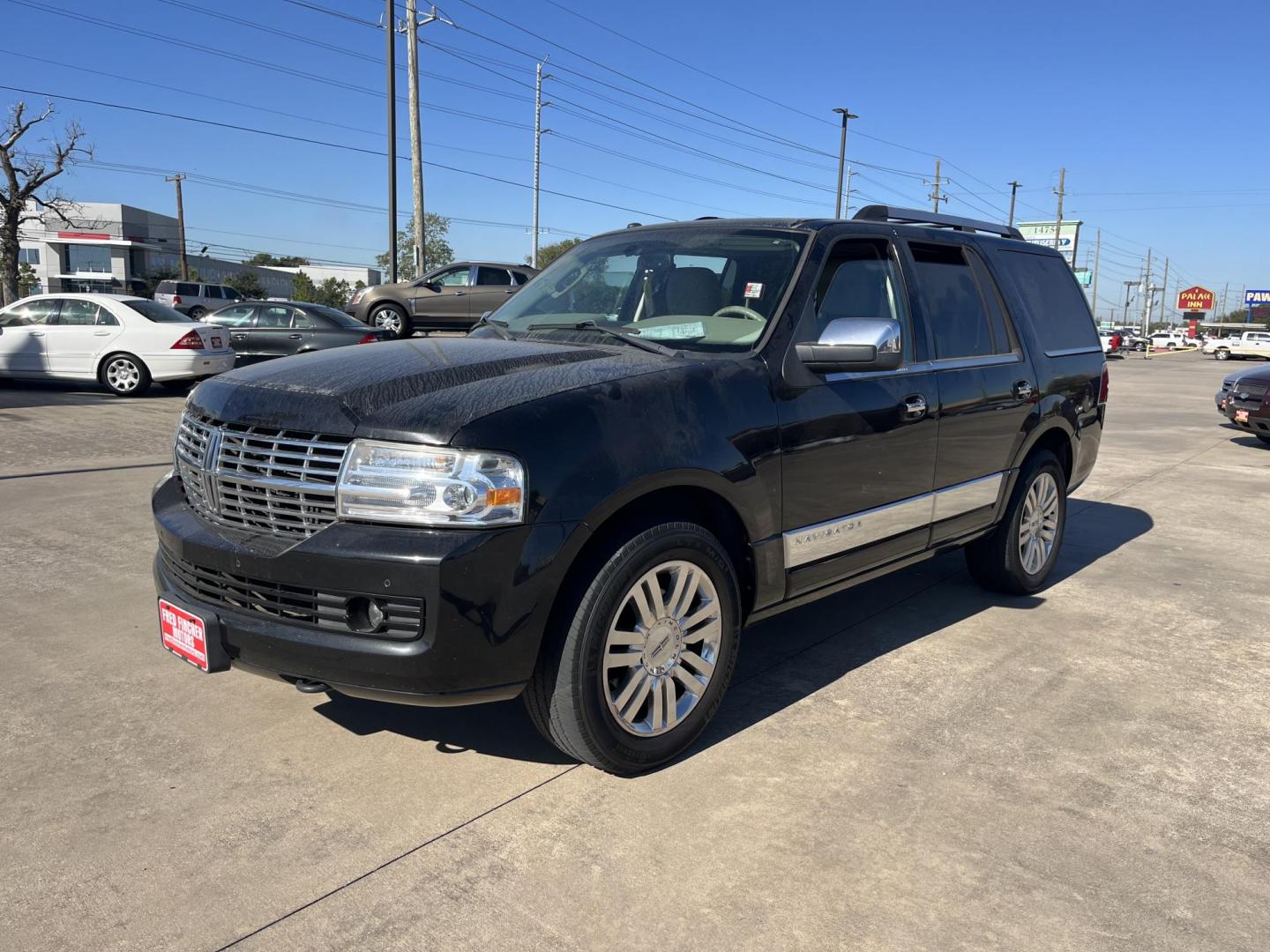 2012 black /TAN Lincoln Navigator 2WD (5LMJJ2H52CE) with an 5.4L V8 SOHC 24V engine, 6-Speed Automatic transmission, located at 14700 Tomball Parkway 249, Houston, TX, 77086, (281) 444-2200, 29.928619, -95.504074 - Photo#2